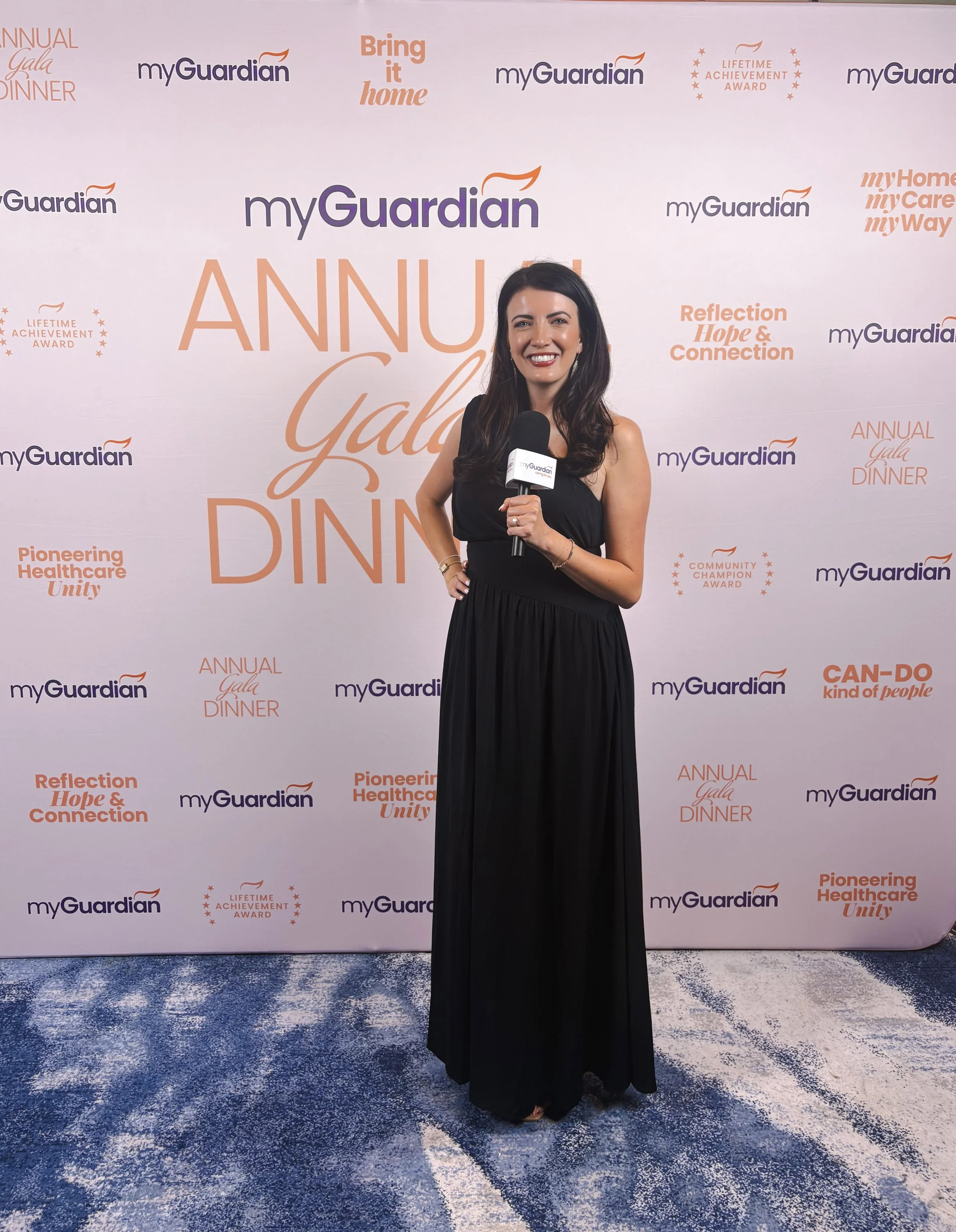 Jessica Bainbridge hosting and interviewing guests as MC at the MyGuardian gala dinner