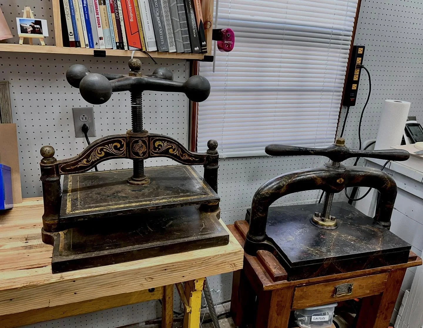 another big book press (left) added to the studio. this is no. 6, but in my defense, I did pass one onto @kyleworthy last year, so its not all weight gain. 

#bookstudio #bookarts #bookmaking #photobookjousting