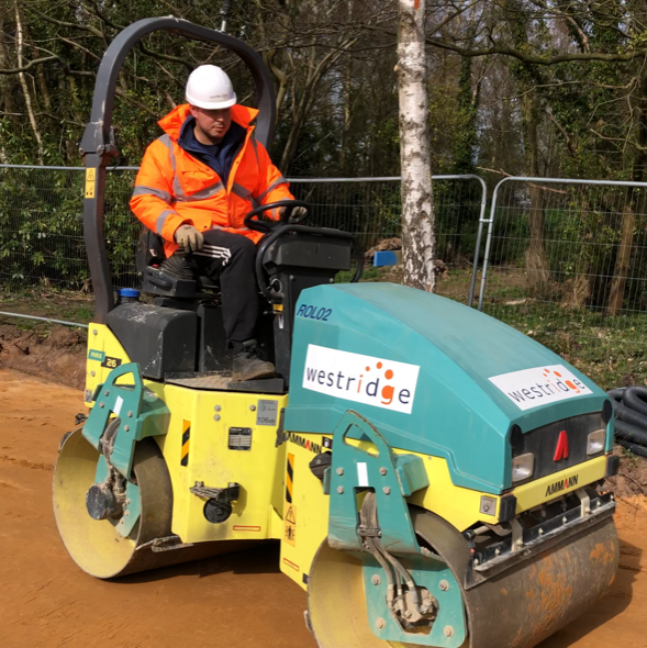 Founder Rob on a construction roller