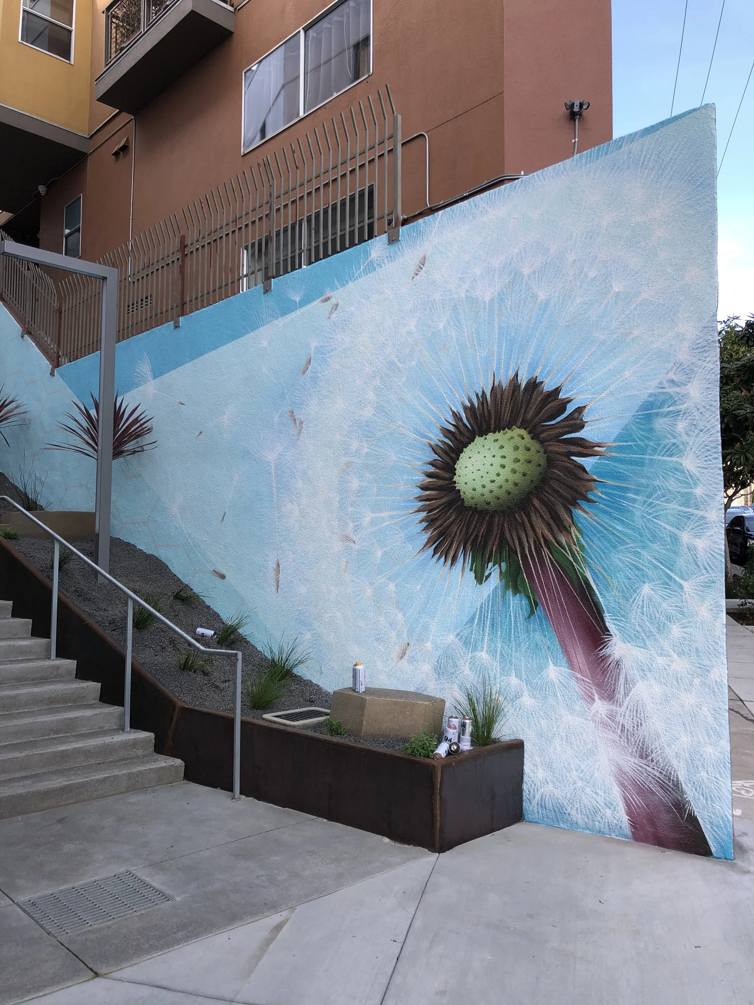 A custom outdoor mural painted at The Landing In Dogpatch San Francisco by 1AM Projects.