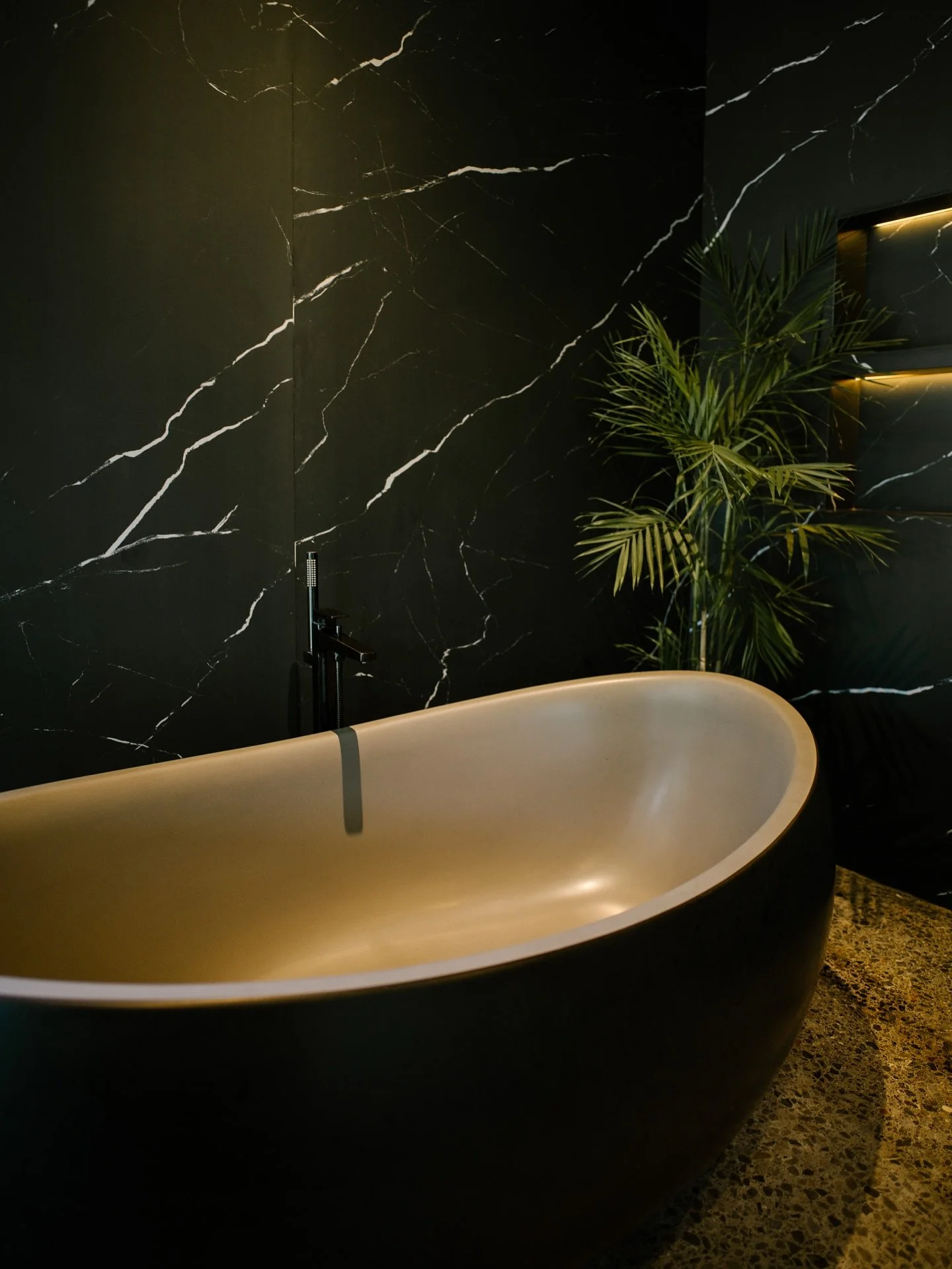 Sophstone&rsquo;s Marina tub and sink. These sculpted vessels are made from a proprietary mineral glass composite and have a satin honed finish. Tub here shown in &lsquo;Colour Dua&rsquo;, the combining a 2nd color (of customer&rsquo;s choice) to the