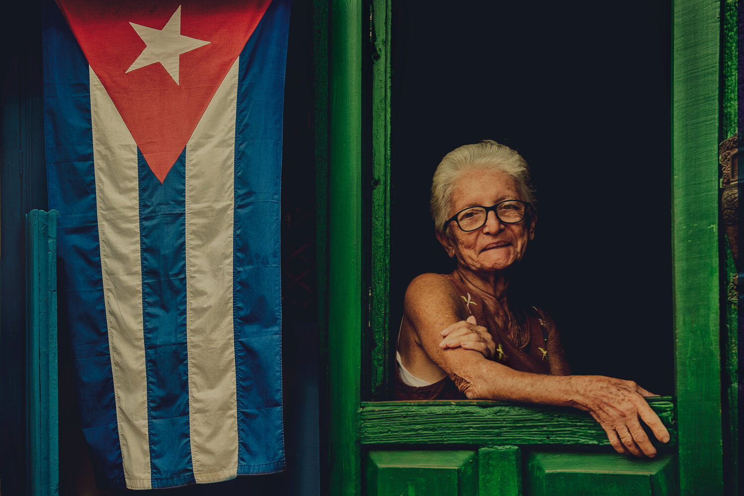 CUBA-OLD-WOMAN-GREEN-WINDOW-FIX.jpg