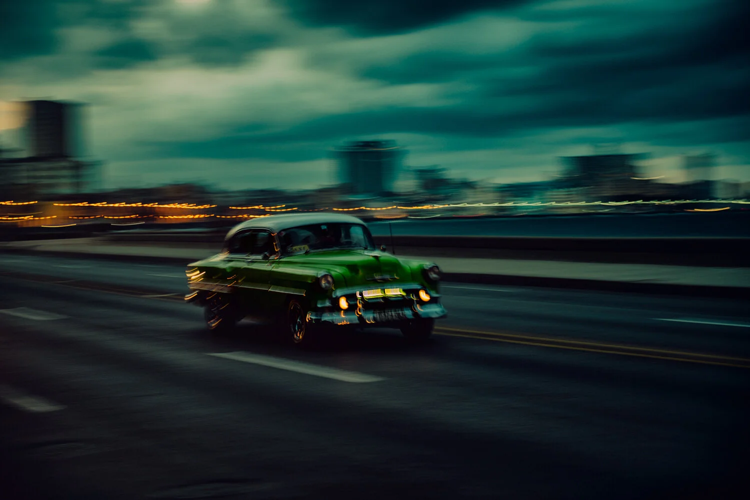 CUBA-GREEN-CAR-MOVING.jpg