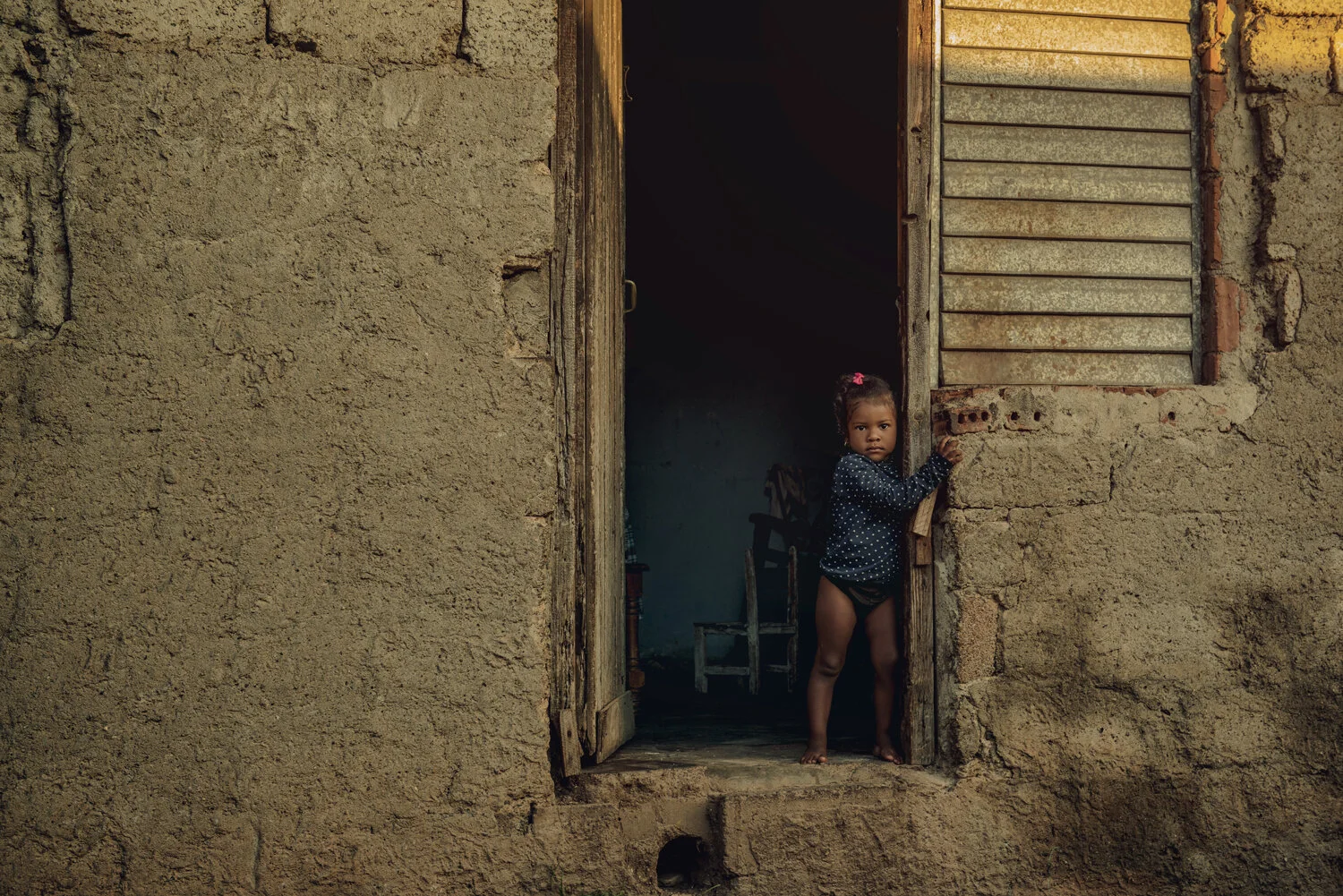 CUBA-BABY-GIRL-DOORWAY.jpg