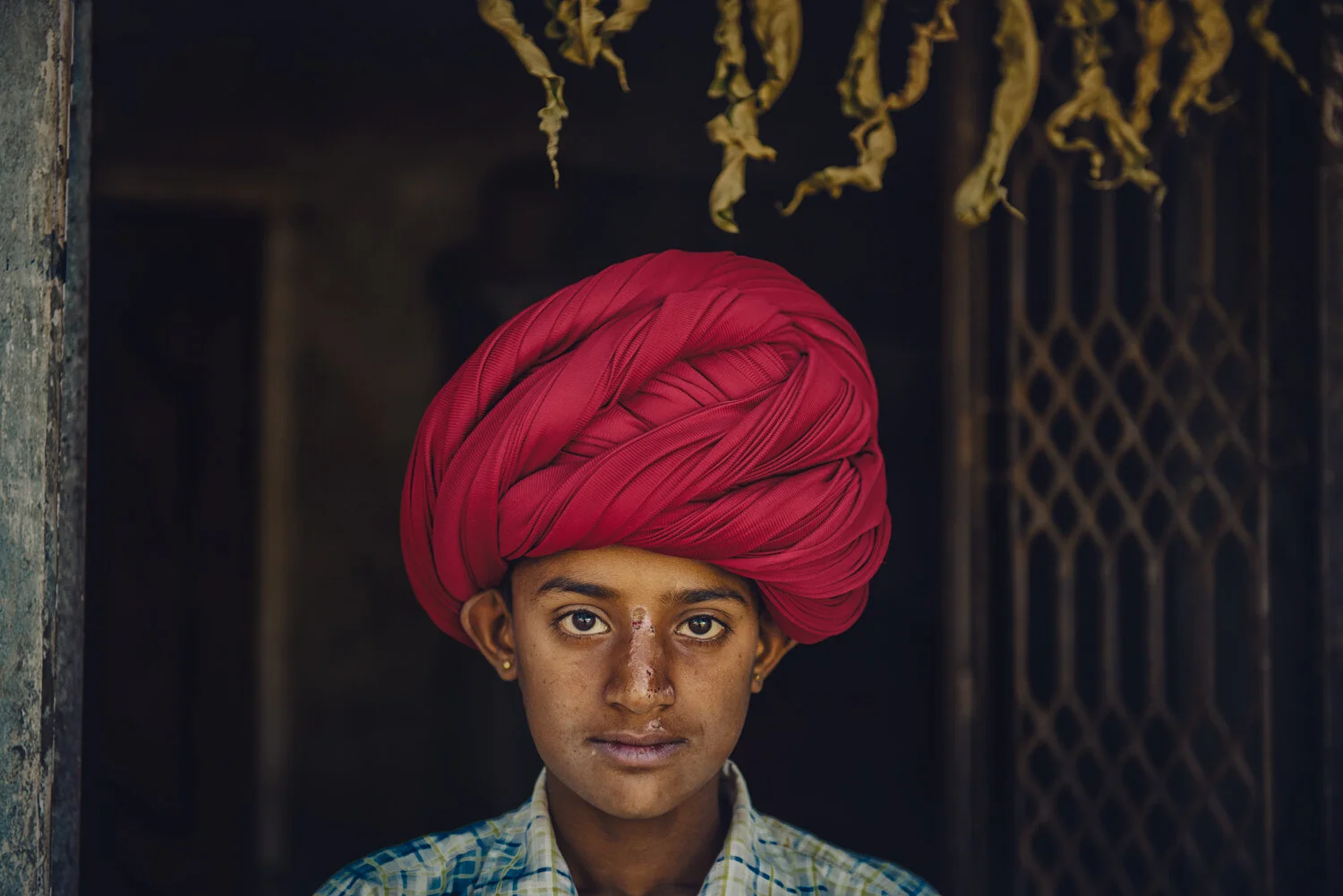 BOY-IN-DOORWAY-RED-TURBAN.jpg