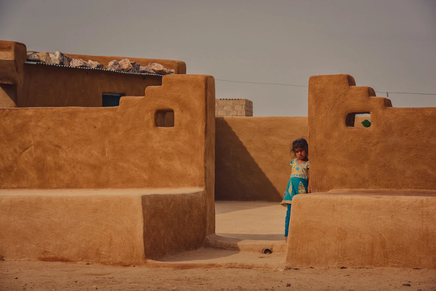LITTLE-GIRL-BLUE-ADOBE.jpg
