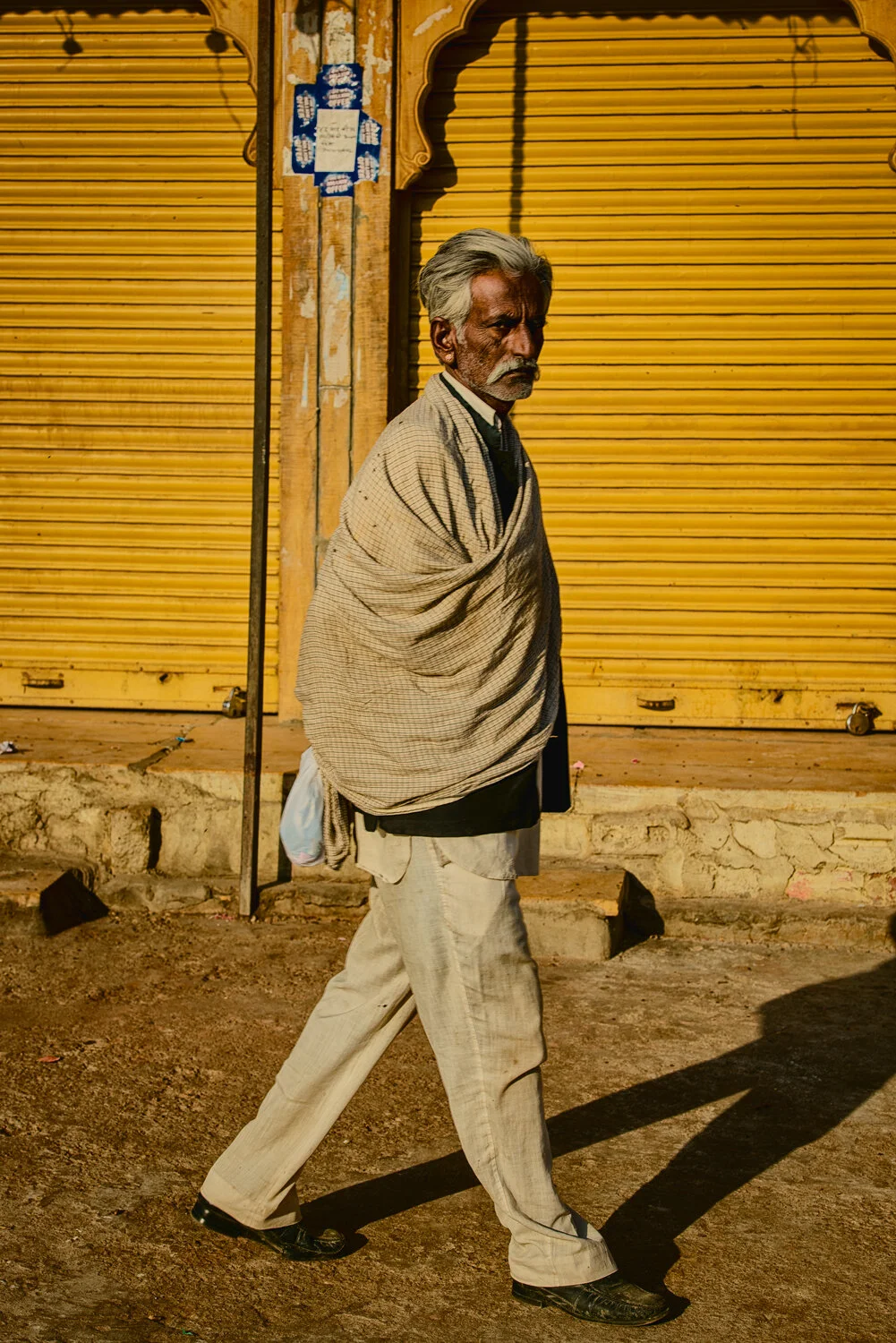 MAN-YELLOW-WALL.jpg