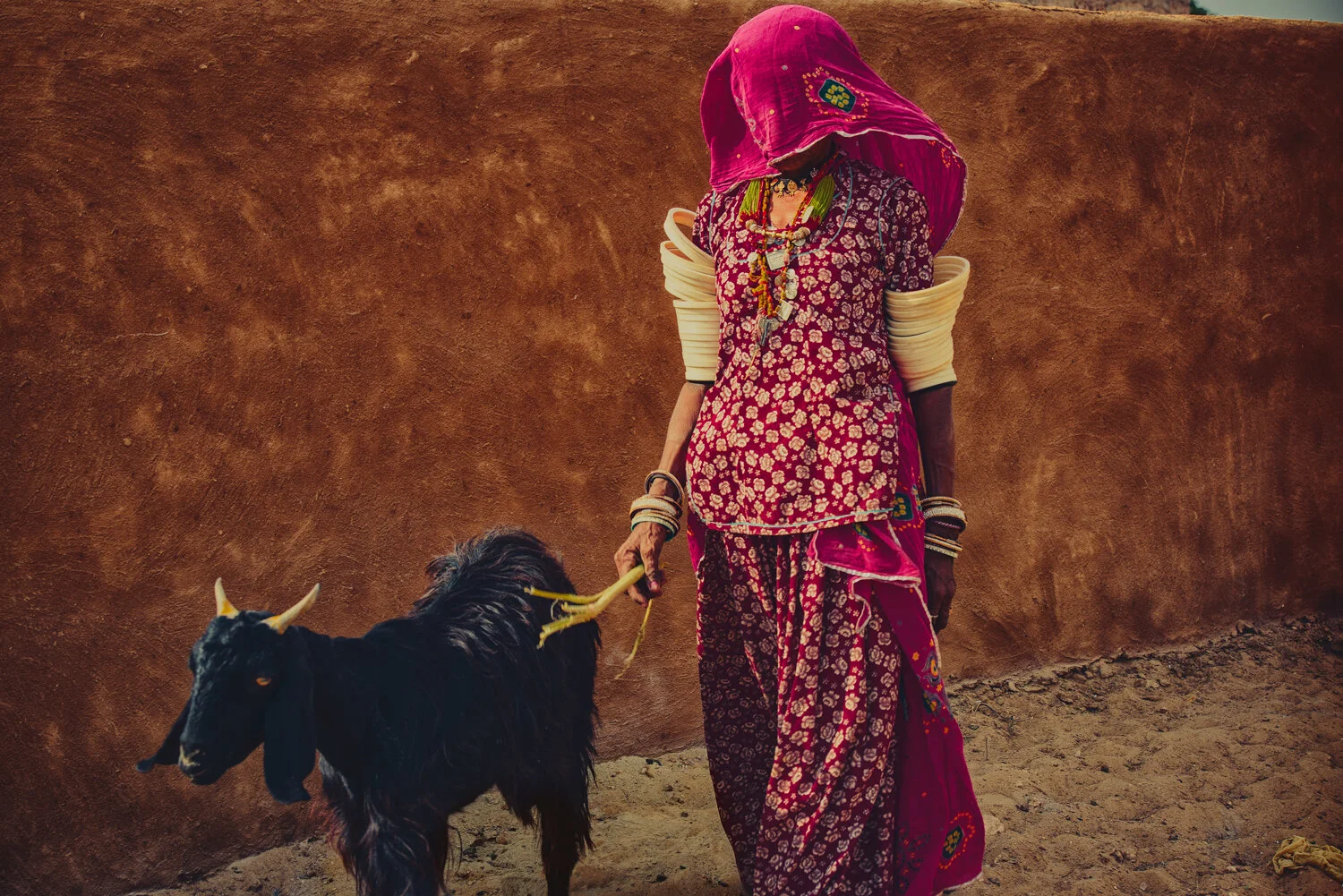 WOMAN-WALK-GOAT.jpg