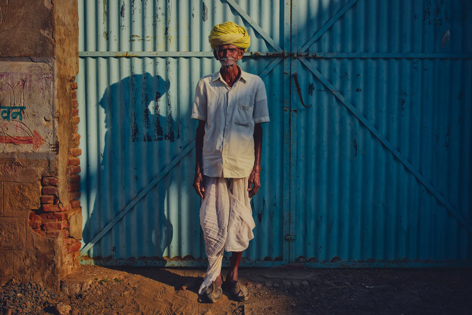 YELLOW-TURBAN-BLUE-WALL.jpg