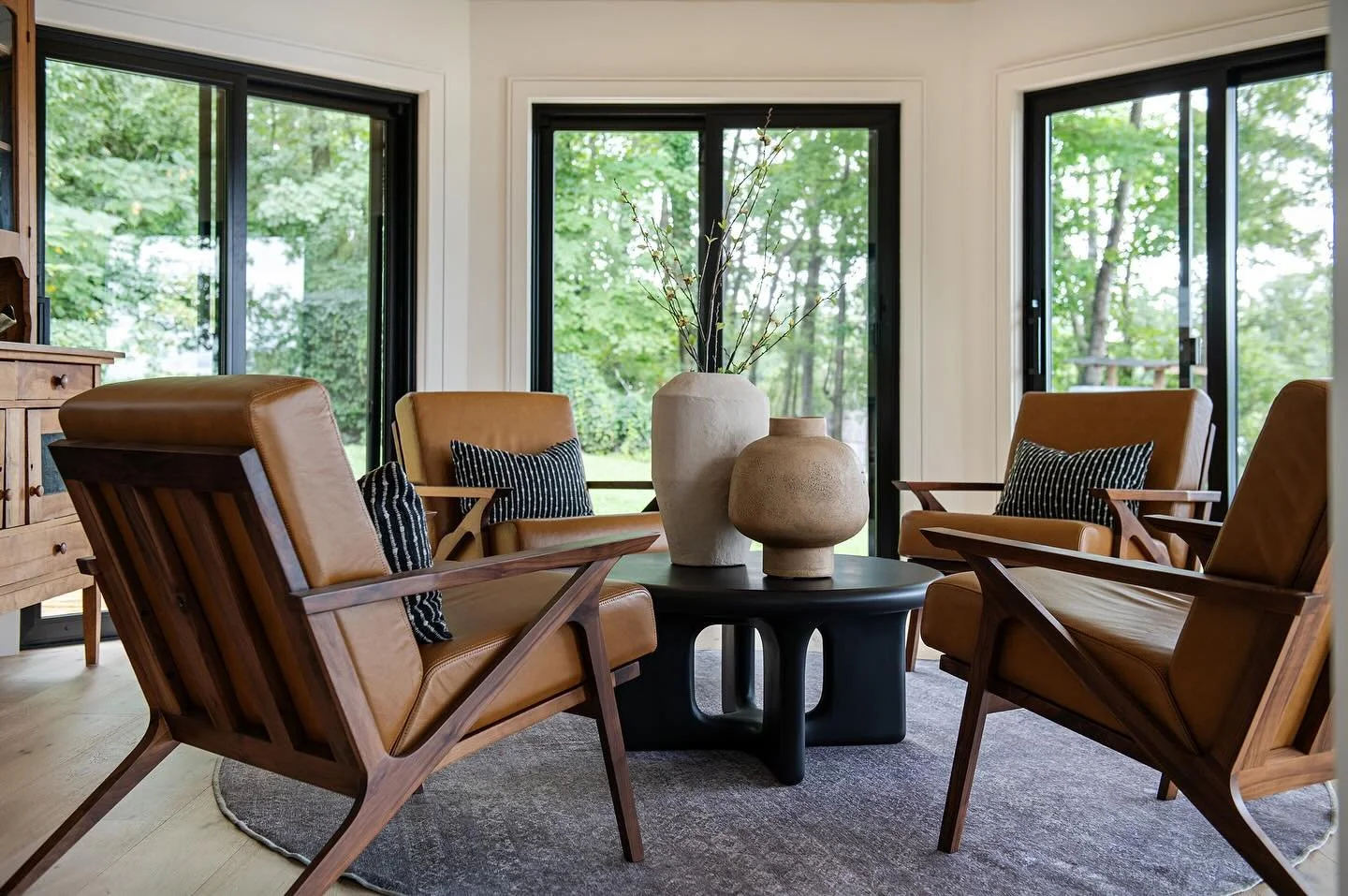 Opened up the wall to let the light in 🌞
This sunroom is now a serene space to relax, recharge, and soak in the views.

#sunroom #renovation #spaceplanning #relax #familyroom