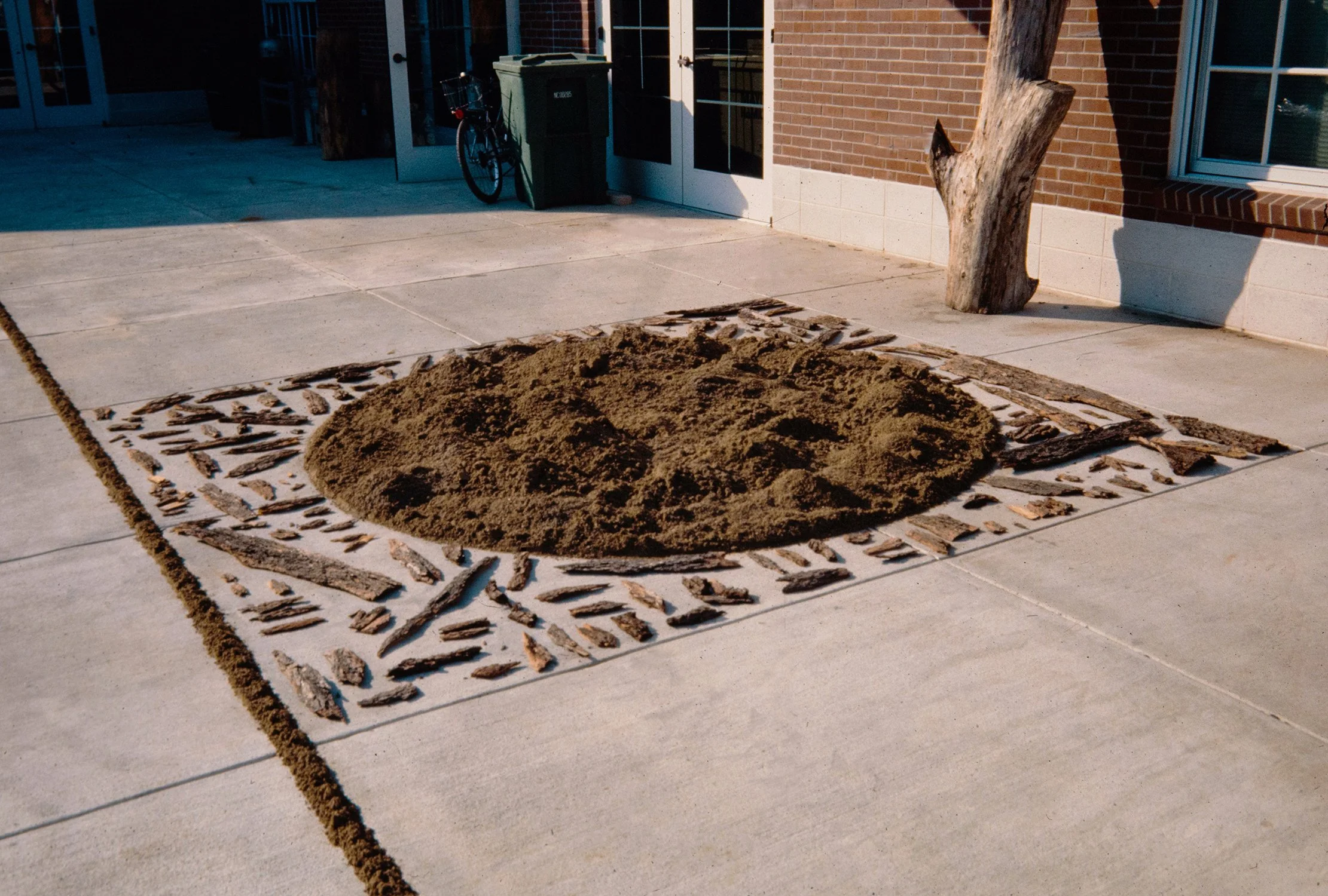Matthew Deleget, Harmony (Circle, Square, Line), 1993, Soil, stones, bark, Approximately 60 x 15 feet, Wabash College, Crawfordsville, IN
