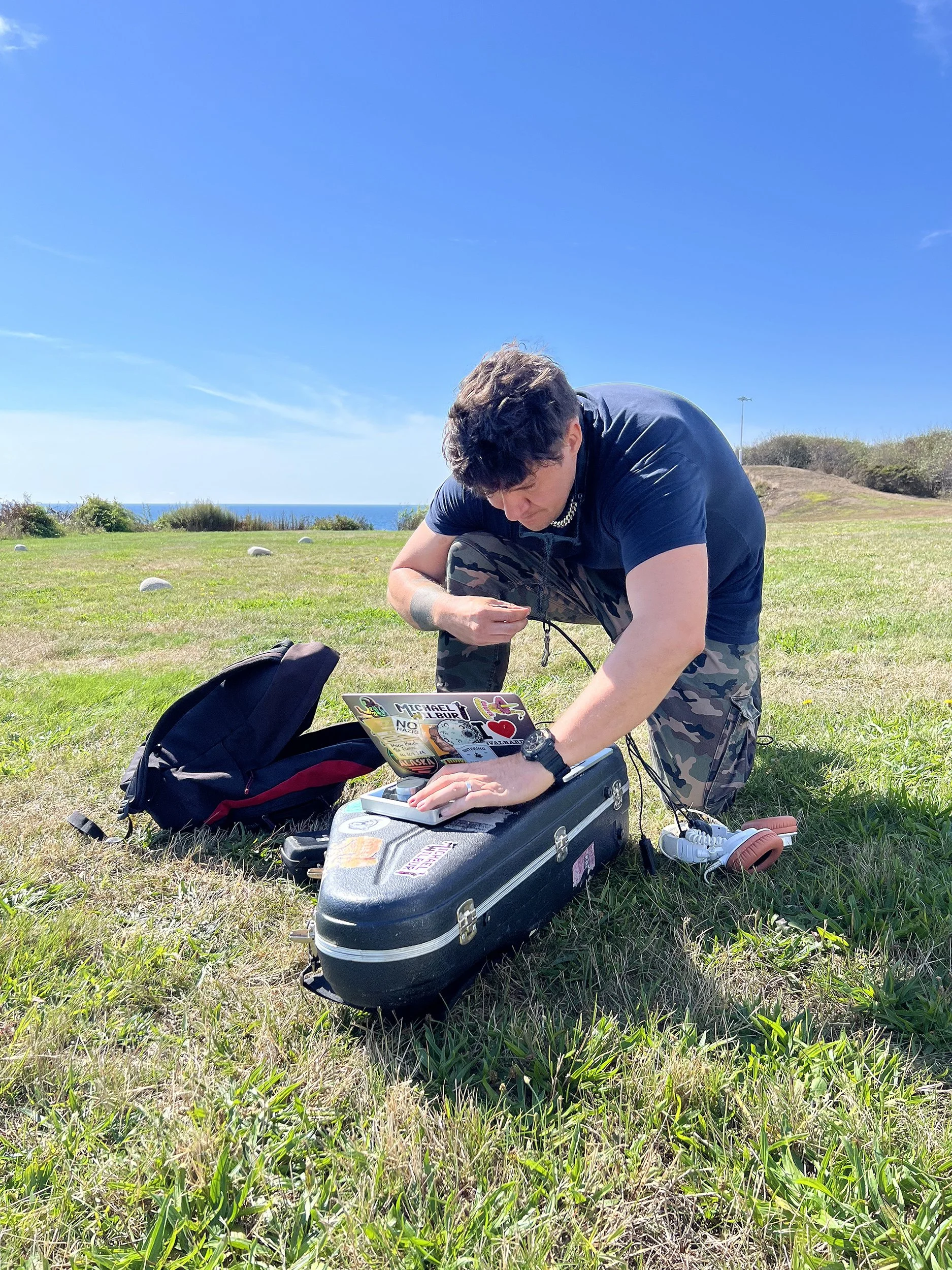 Michael Wilbur preparing the audio recording equipment for his performance. 