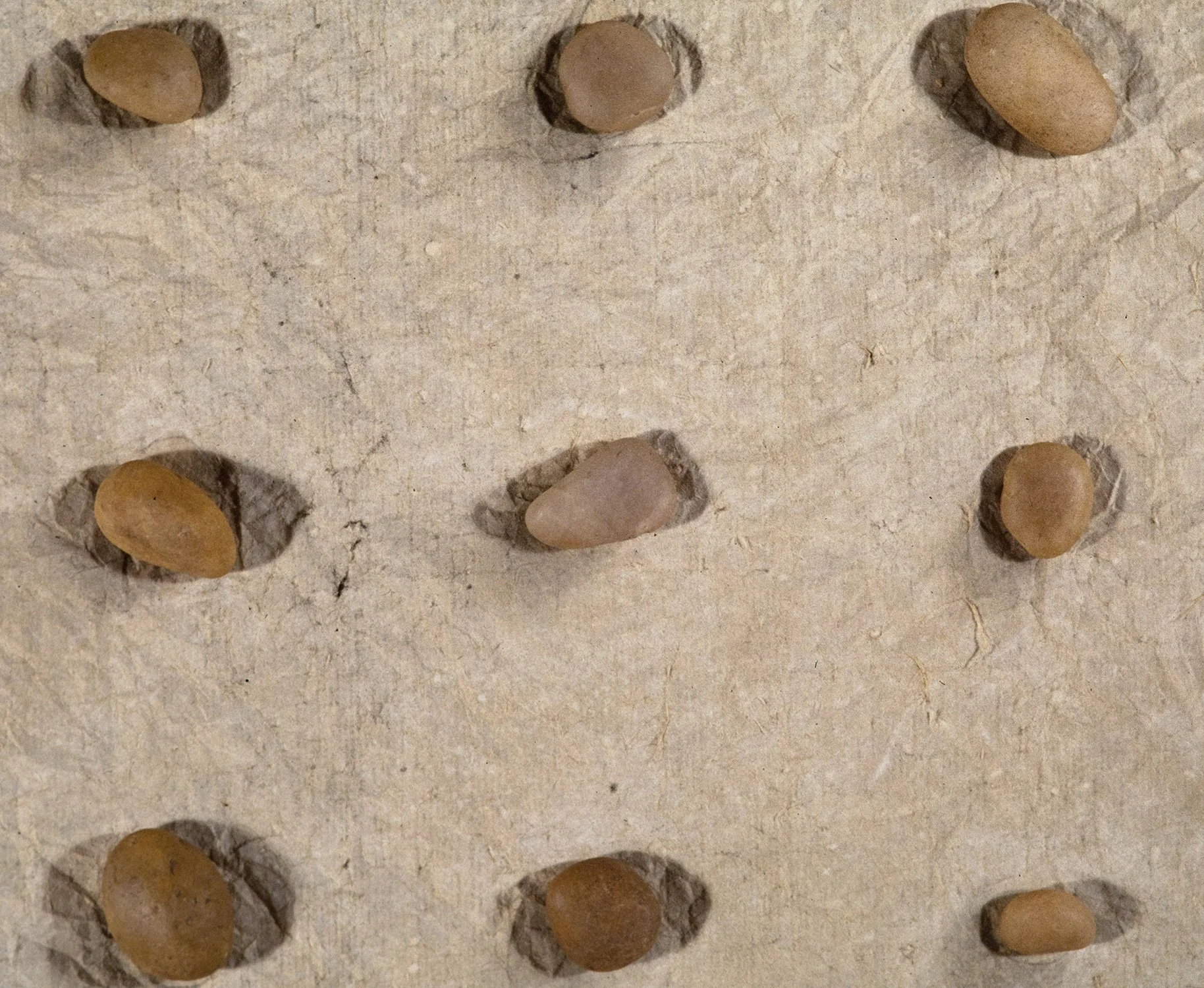 Matthew Deleget, 25 Stone Grid (detail), 1995, Pencil, chalk, and stones on Japanese Kozo paper, 17 x 16 x 1 inches