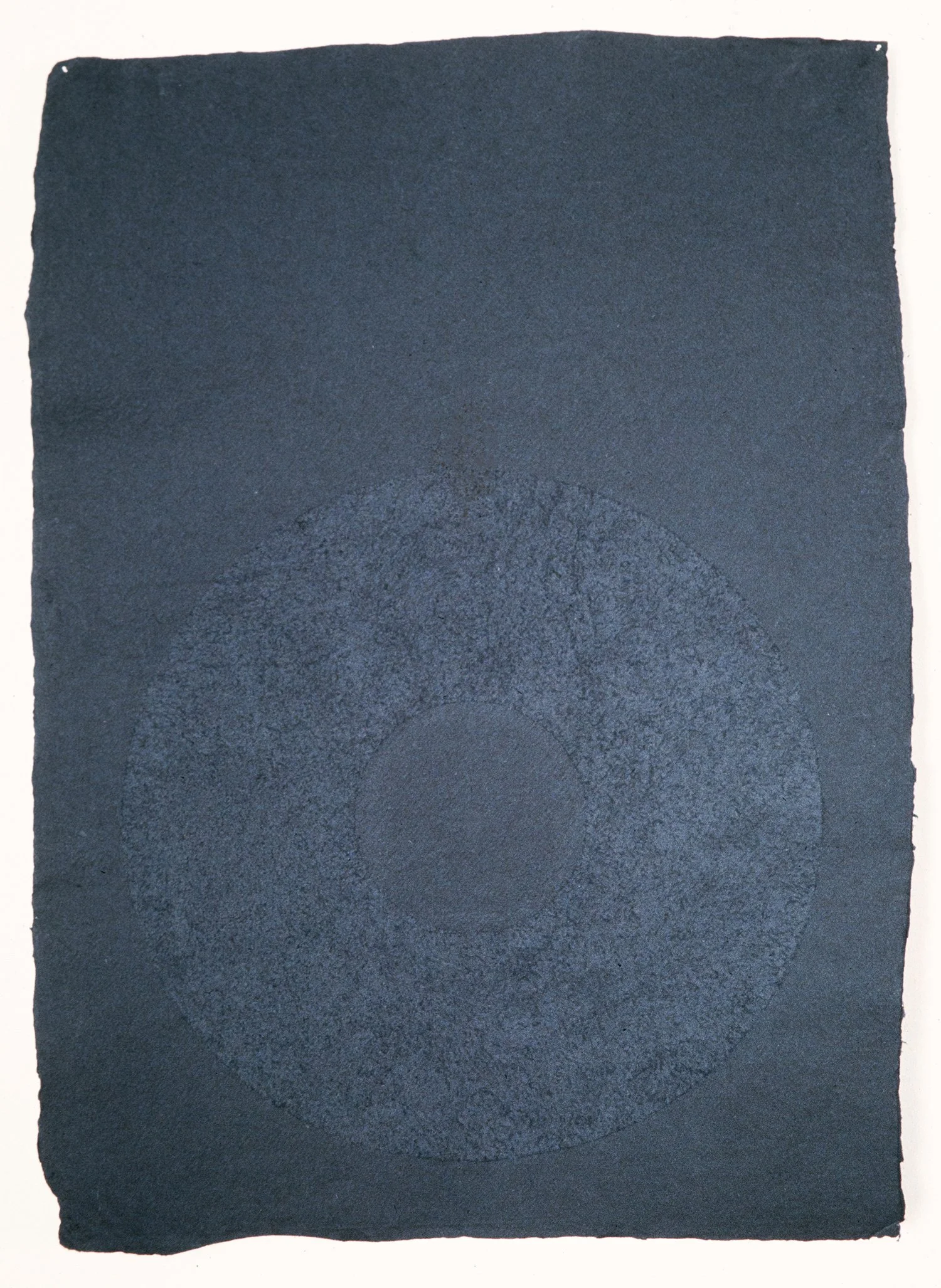 Matthew Deleget, Umbrae of Charon, Pluto, 1996, Circle scraped into black handmade paper, 31 x 22.5 inches, #224