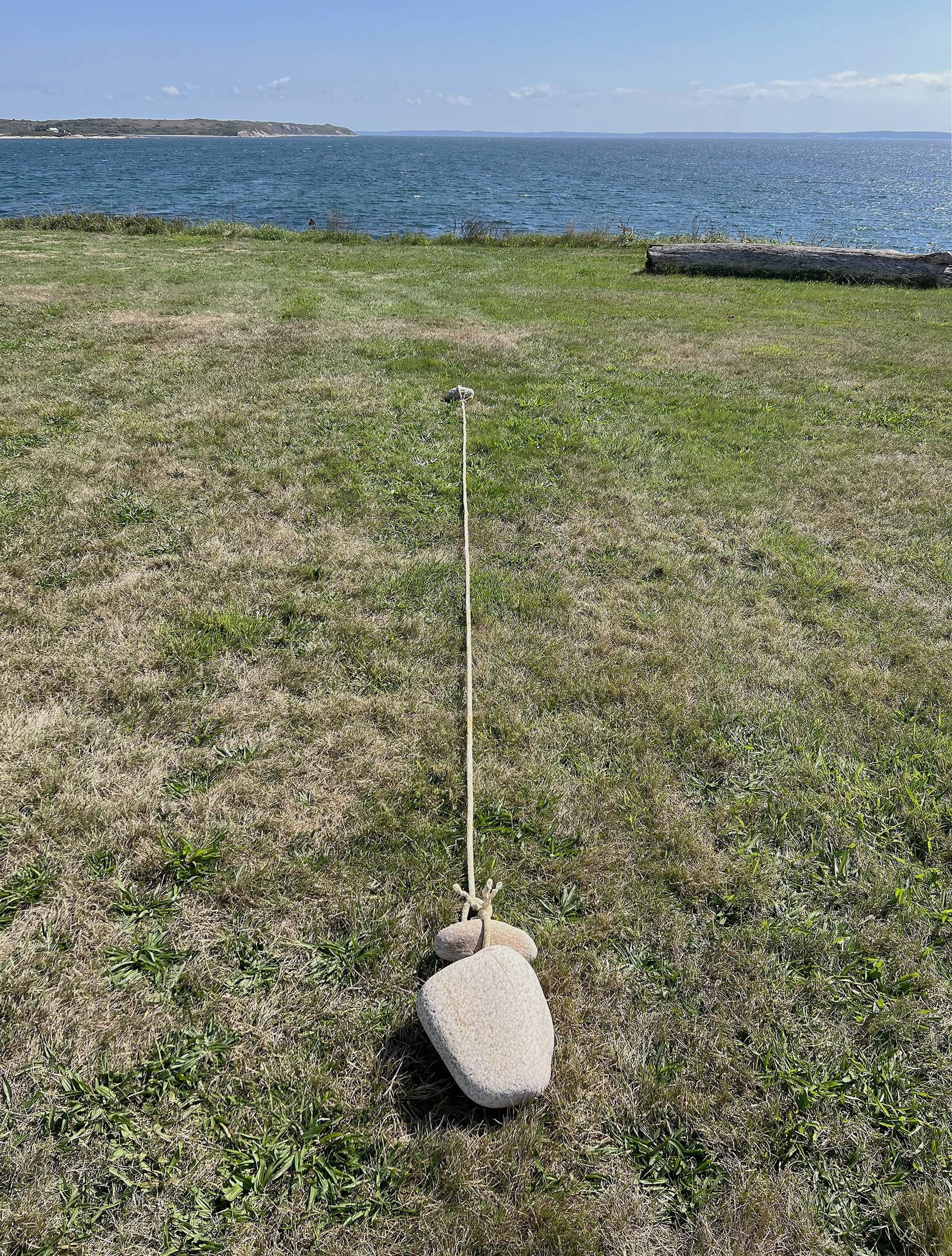 Laying out the first two stones facing due east.