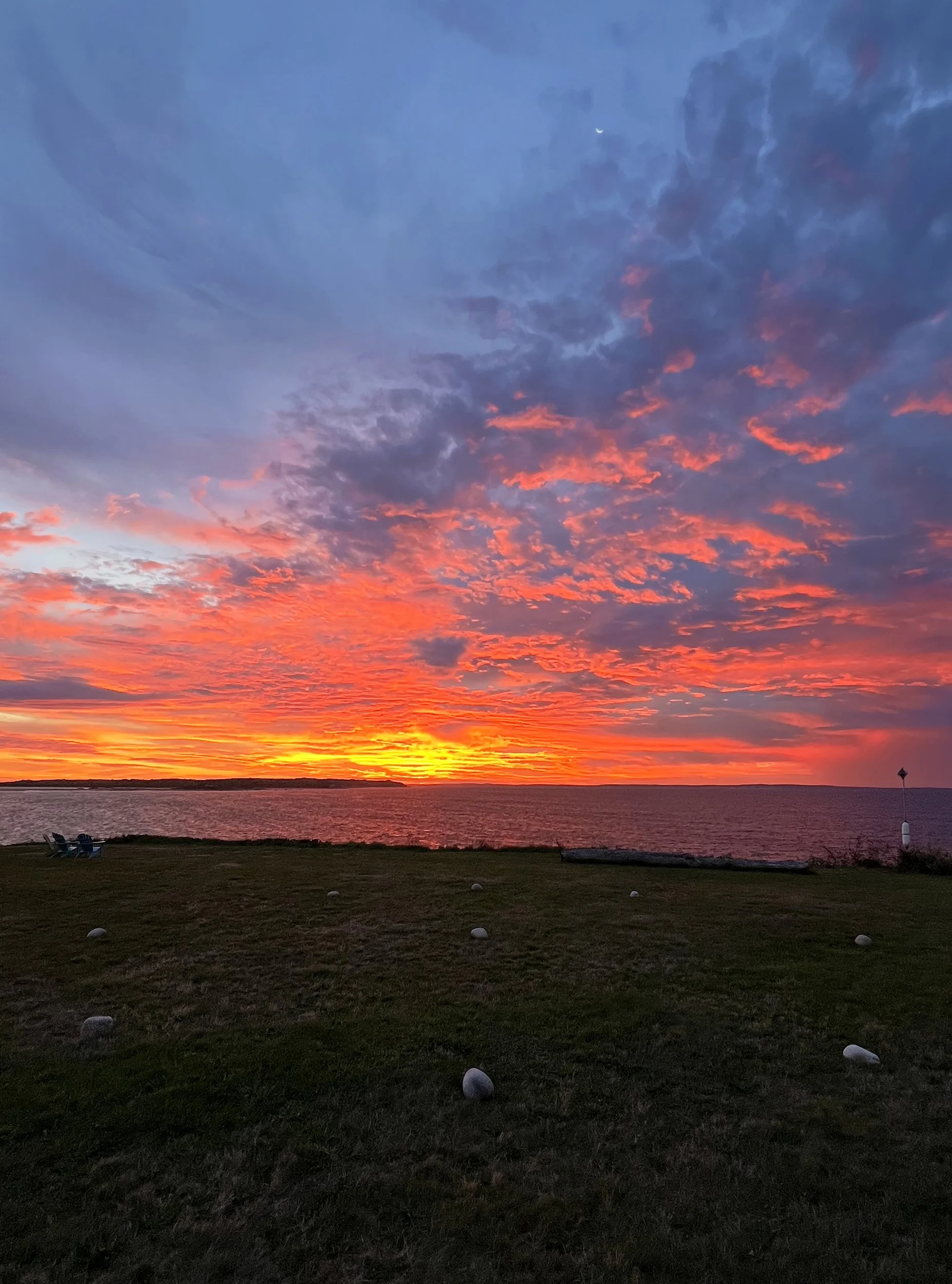 Sunrise facing due east with the Moon above, September 17, 2025, 6:16am EST