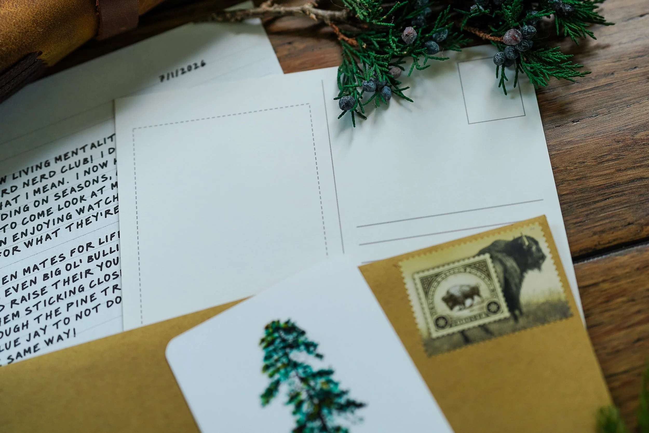 The OUT Post snail mail subscription contents including watercolor art print, faith encouragement letter, and pass-along postcard