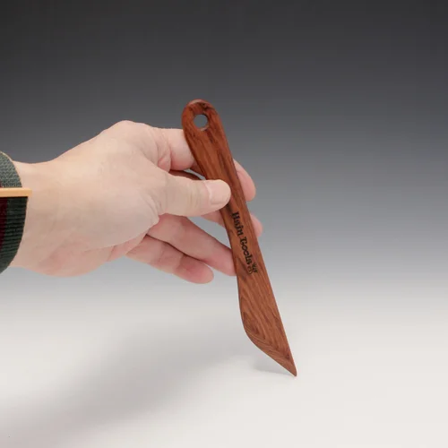 A #5 Mopane Wooden Knife (© Copy right #TXu 1-961-453) by Designed Master Potter Hsin-Chuen Lin 林新春