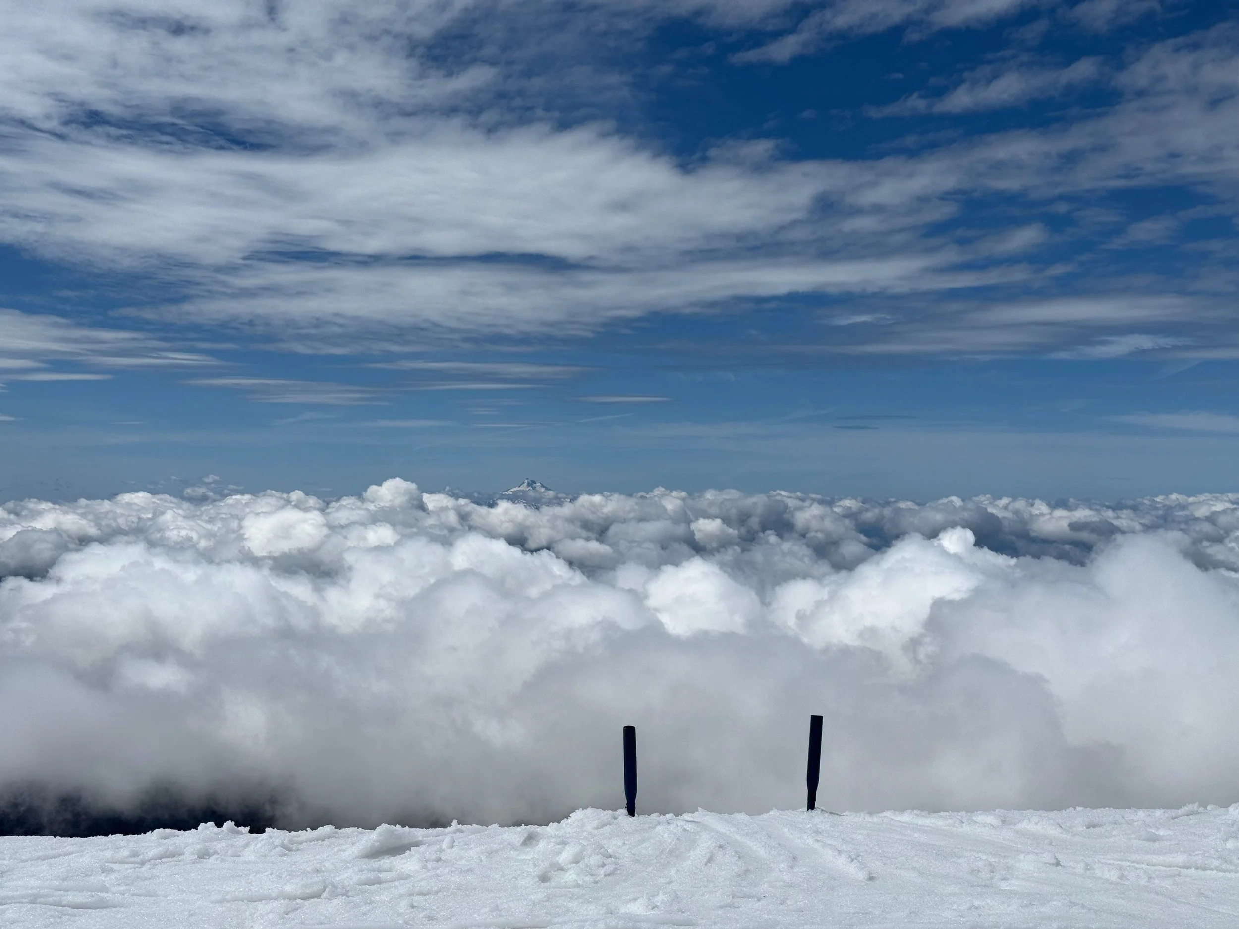 Above the clouds at Mt Hood summer ski camp with panoramic mountain views from Palmer Glacier