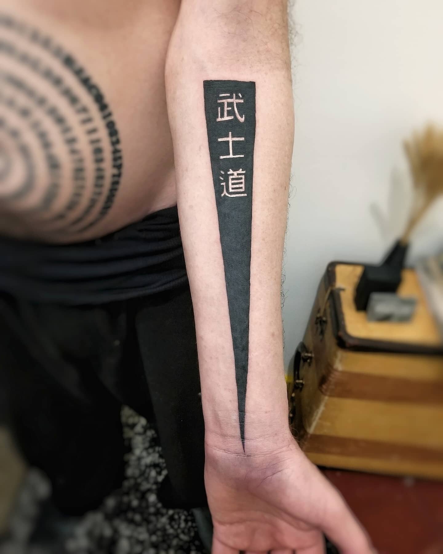 Tattoos for jujitsu sensei 
It was an honor to do these tattoos for my friend who became a sensei in jujitsu in the Japanese eizan ryu form of martial arts and these tattoos mark his becoming his sensei after his 3rd black belt.

Left arm: bushido
Ri