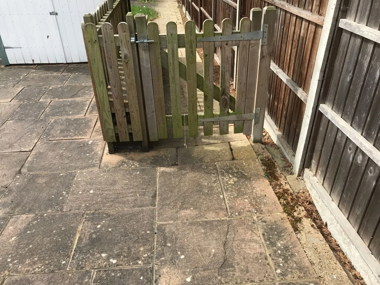 outdoor patio with wooden fence.JPG