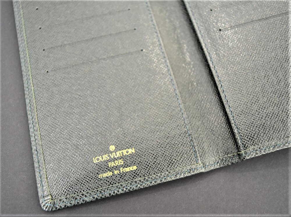 SOLD-Authentic Louis Vuitton Taiga leather long wallet. 4” x 6.5