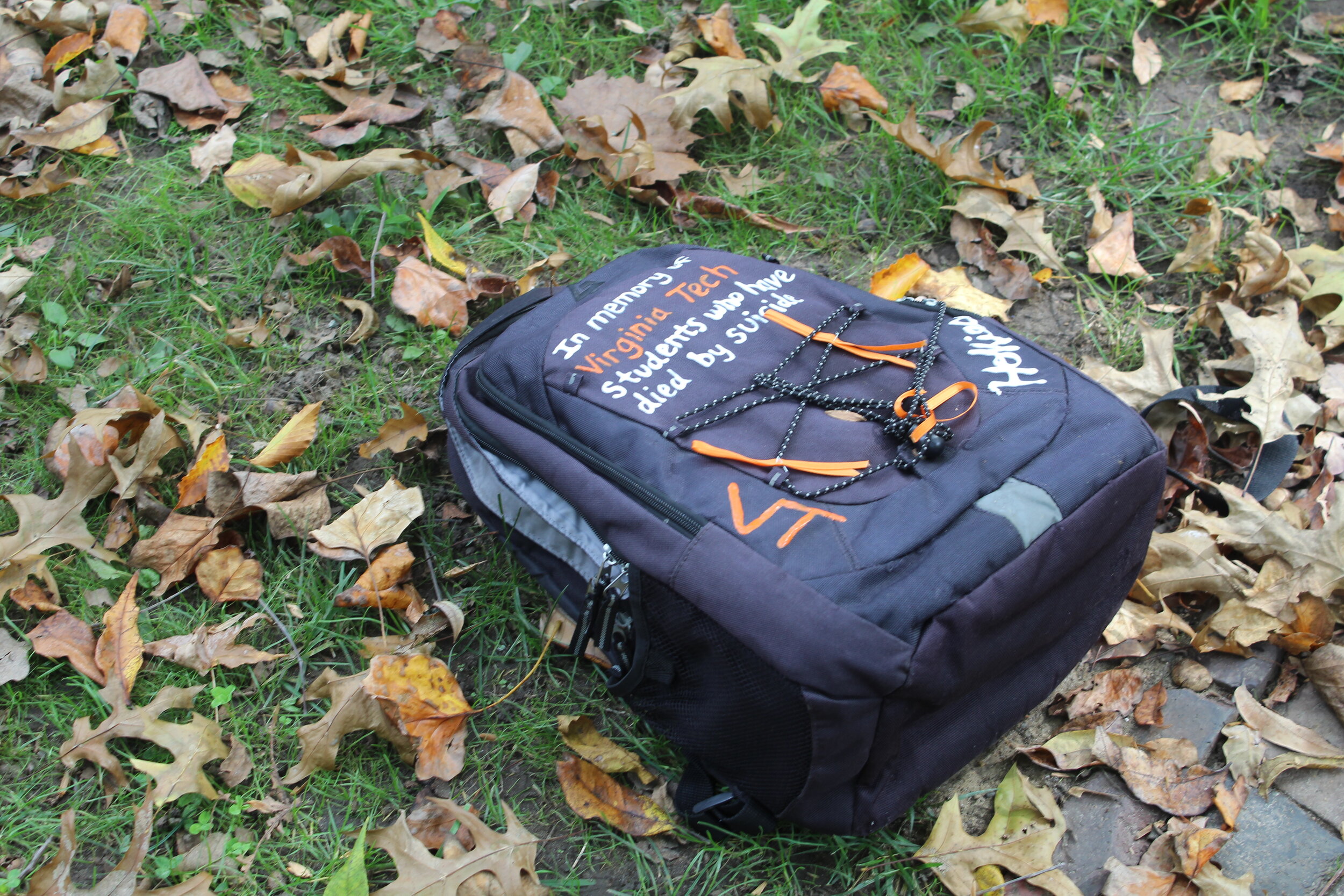  A book bag donated by Virginia Tech is displayed to commemorate students who have died by suicide. Photo by Emily Zeiler. 