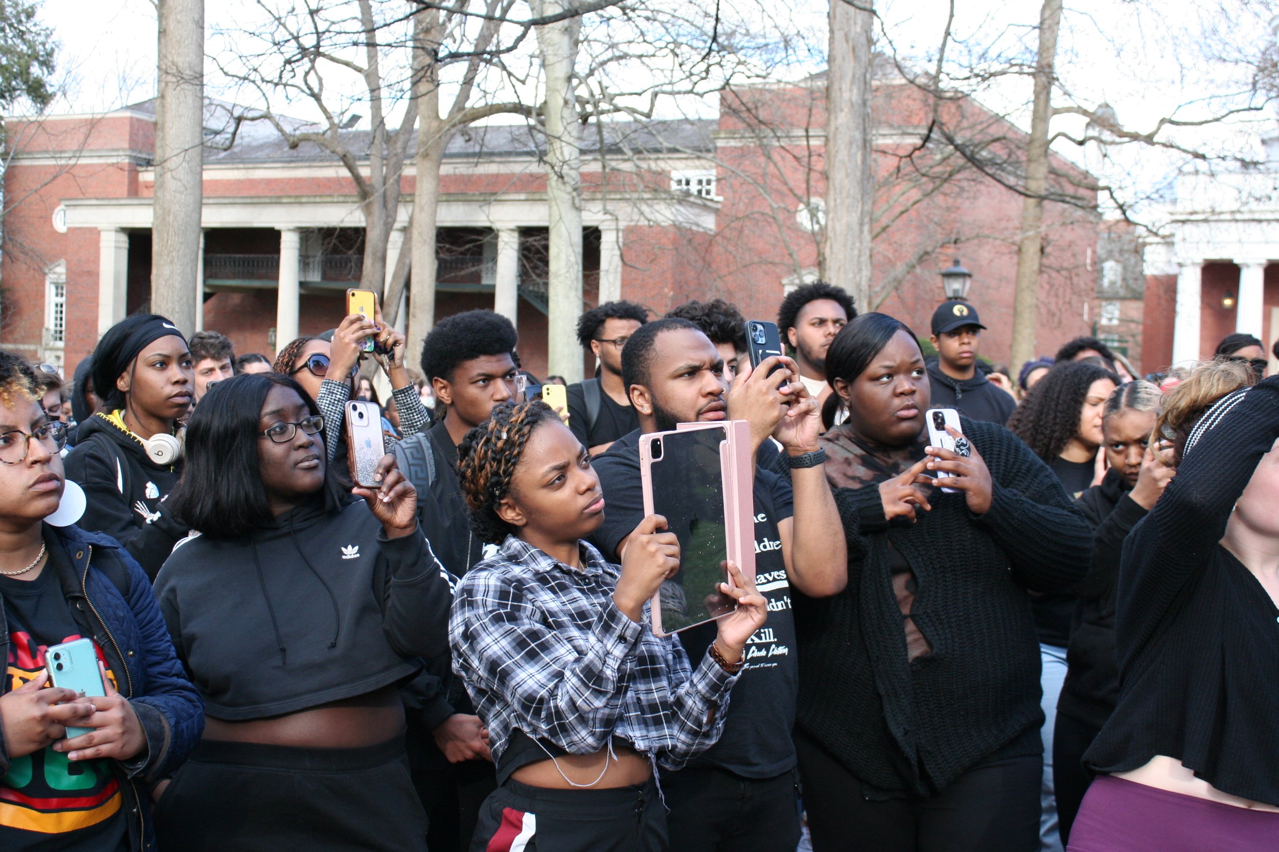  Students videotape and livestream Ohio University President Sherman’s address to the protesters. Photo by Audrianna Wilde. 