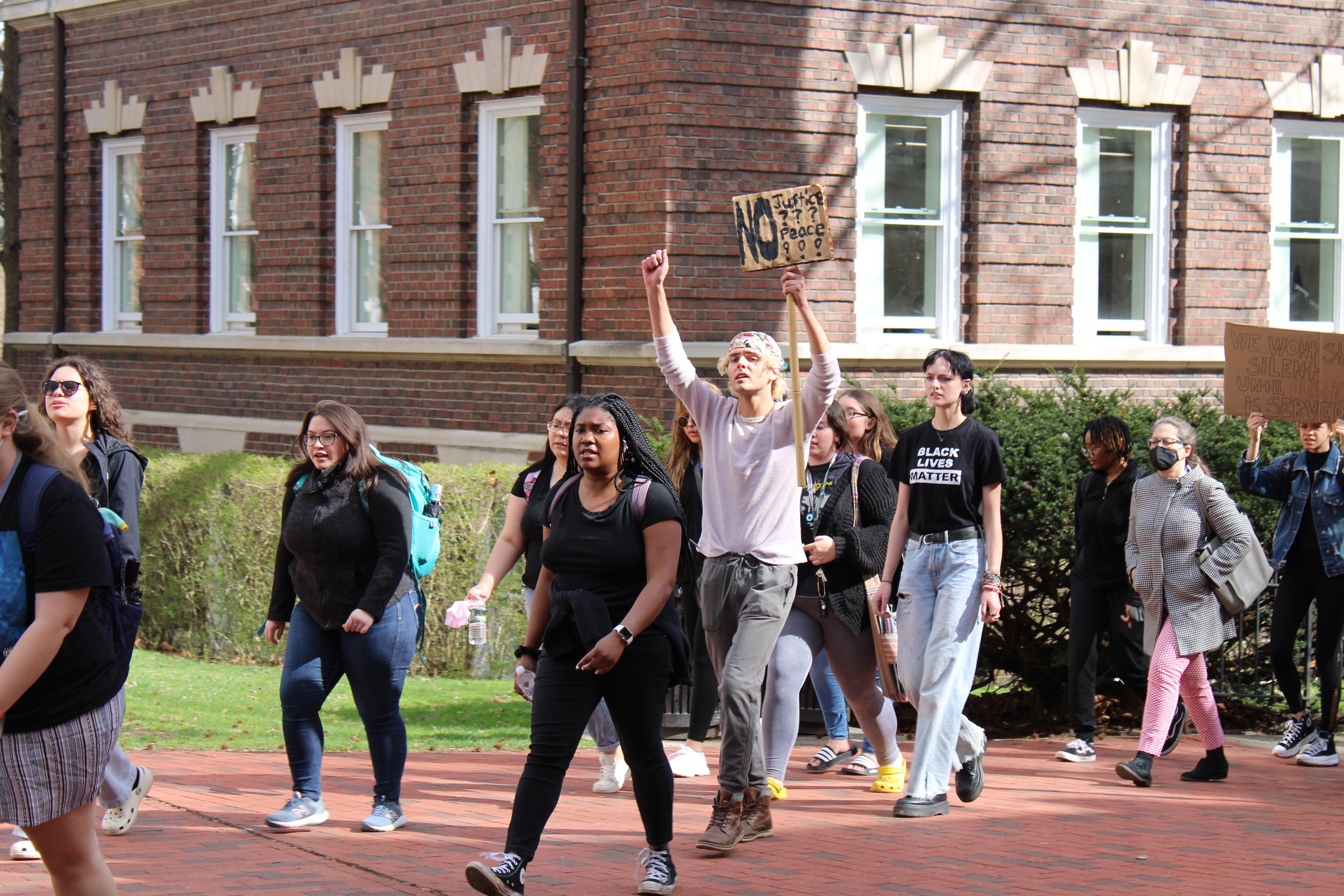  Protesters arrive in front of Cutler Hall. Photo by Izzy Keller. 
