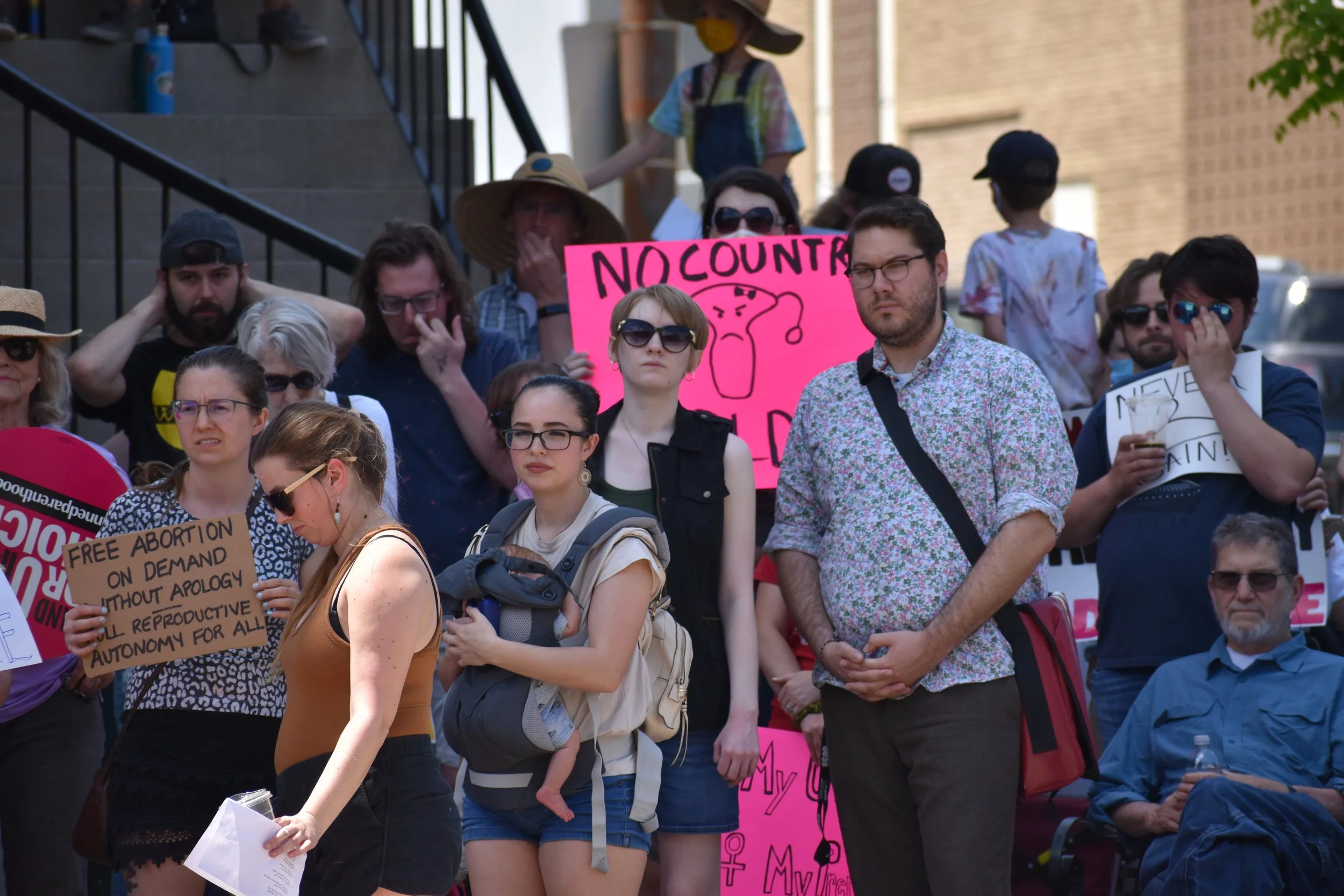  Protestors stand outside the Athens County Courthouse in support of abortion rights. Photo by Bo Kuhn. 