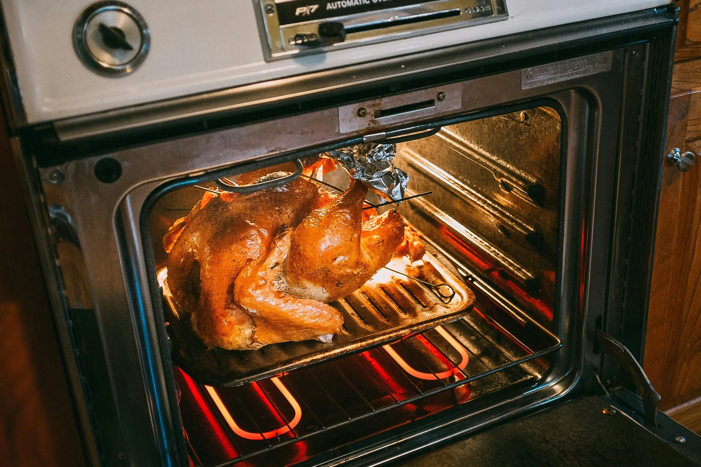 a large turkey is shown in the middle of an open oven