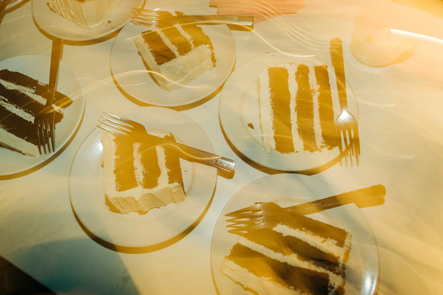 Cake is plated for guests during a wedding at Juliet in Somerville, Massachusetts.