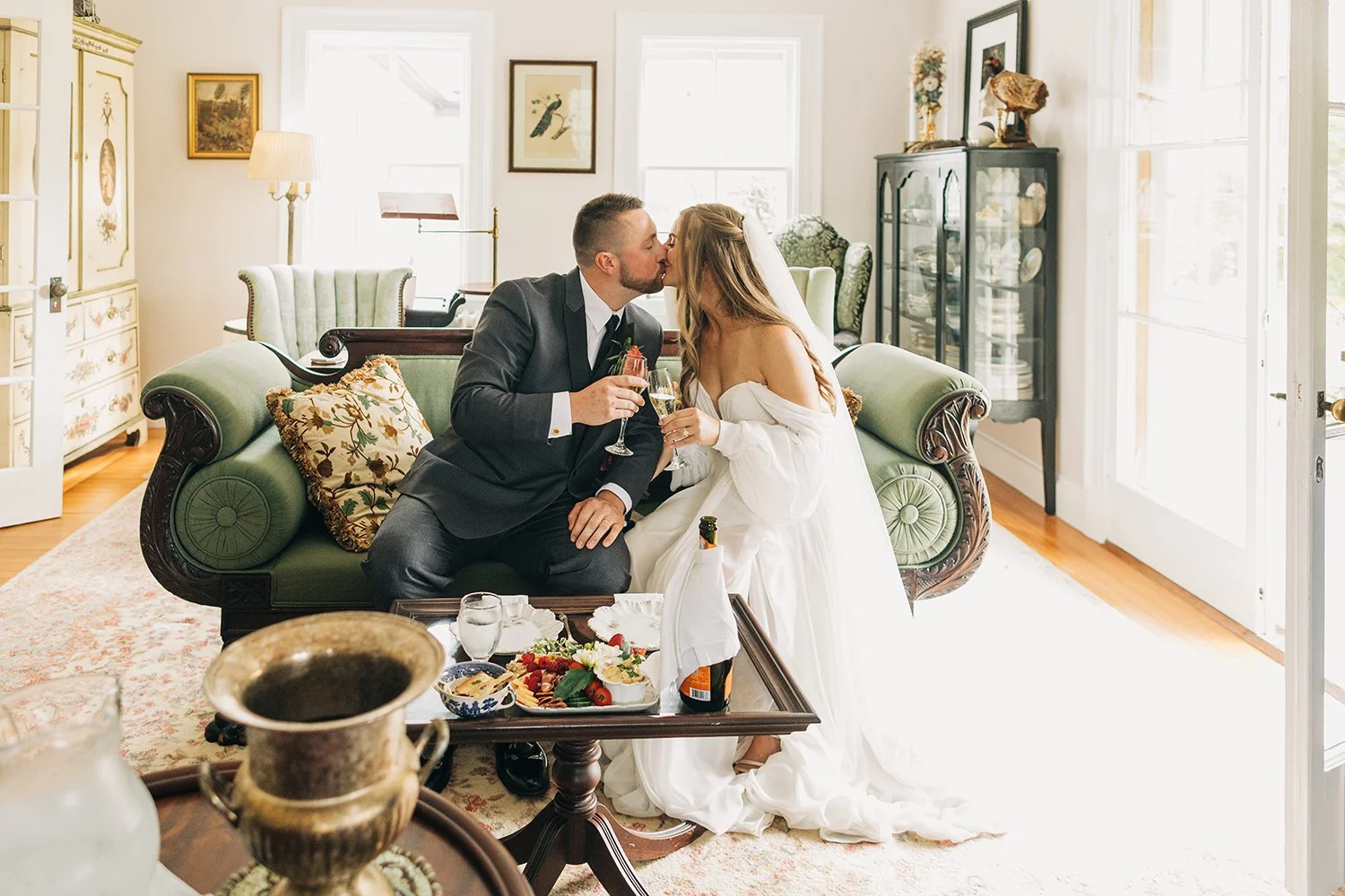 A bride and groom eenjoy a snack during their wedding at western massachusetts wedding venue gloriosa and co