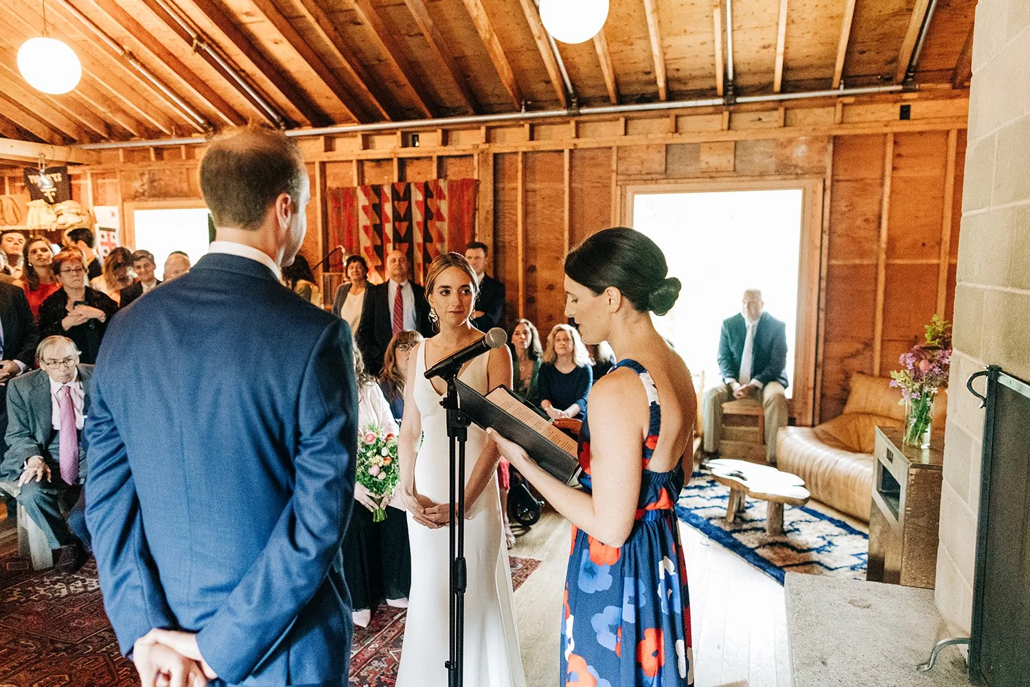 A bride and groom stand together during their Berkshire wedding at Tourists in North Adams, Massachusetts