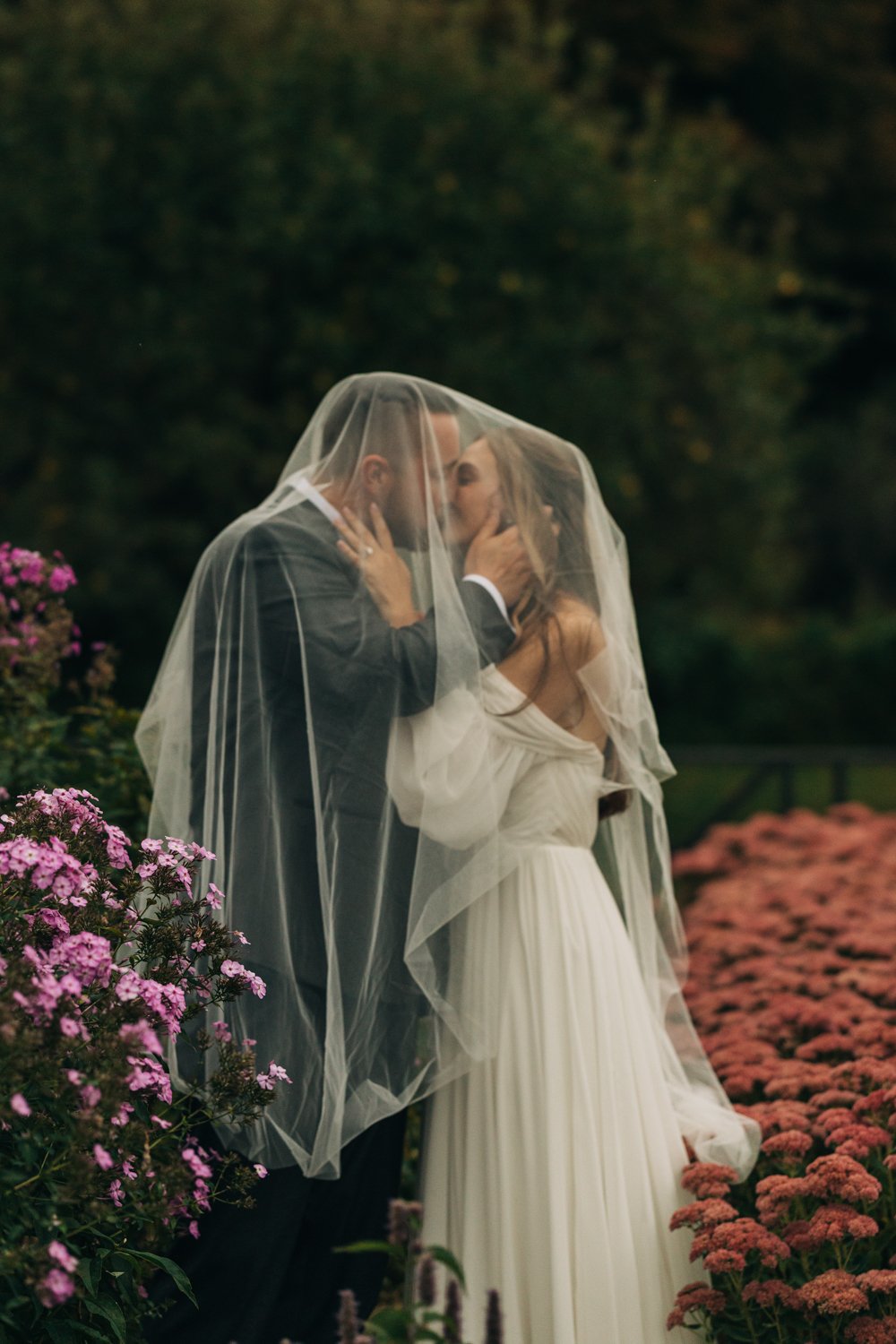 Portrait of a bride and groom embracing during a wedding at western massachusetts wedding venue Gloriosa & Co in Ashfield, Massachusetts.