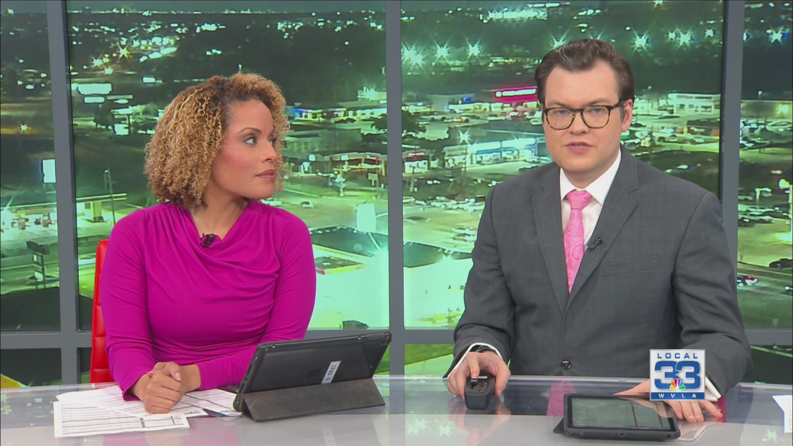 Ashley Moss and Andrew at the Louisiana First News anchor desk