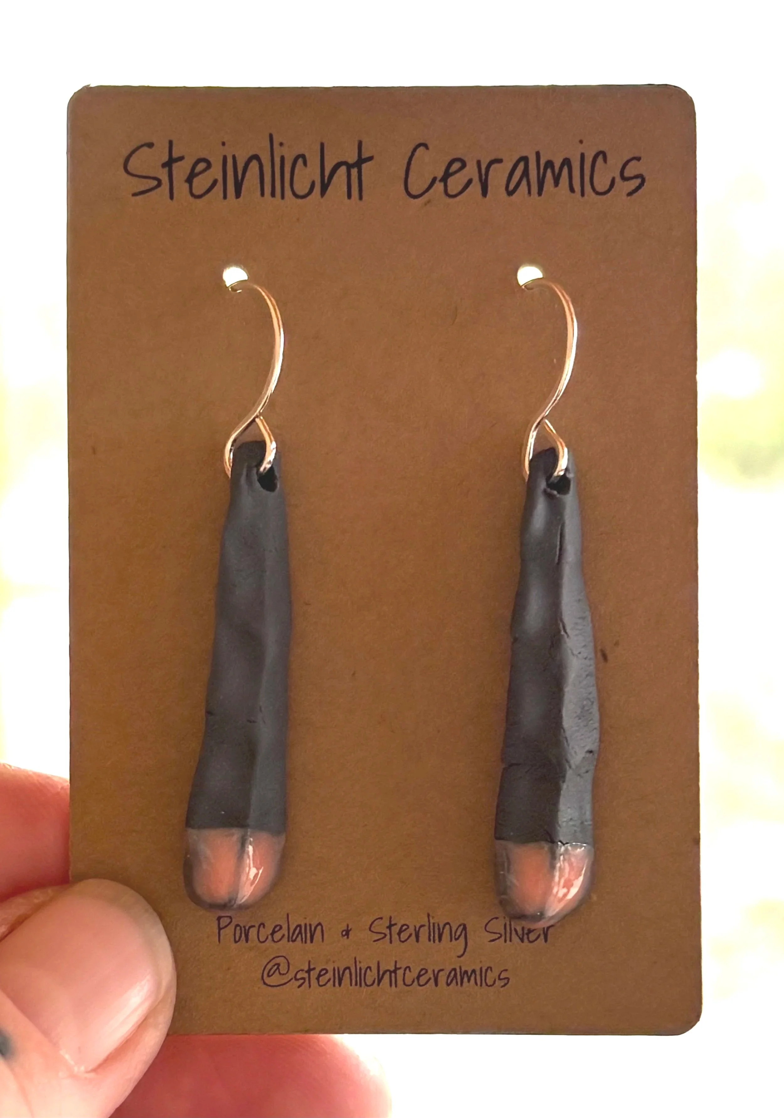 Long Black Porcelain Feather Earrings with Pink Glaze