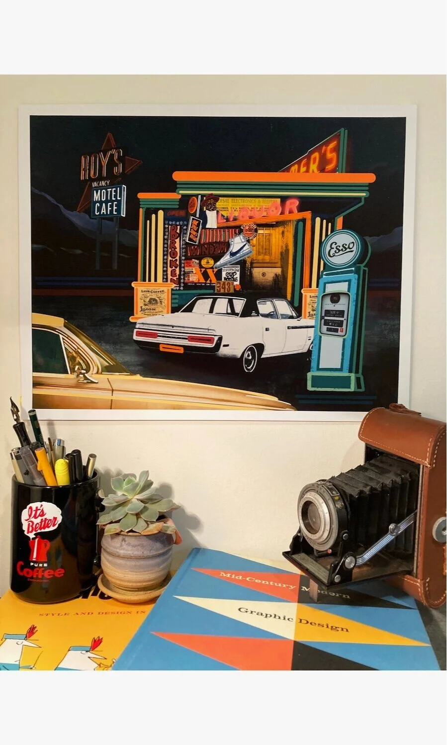 Neon Convenience art print by Daniel Hargrove: classic cars, a neon-lit roadside shop, motel signs, and a vintage gas pump.