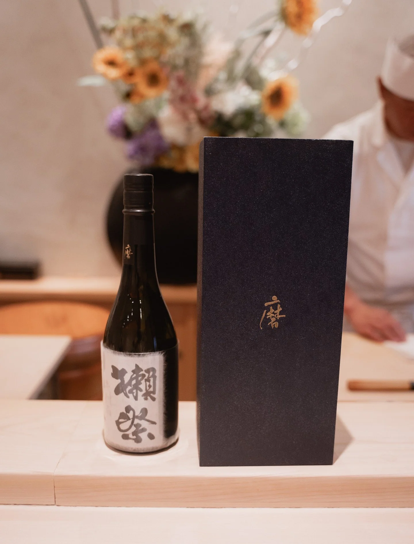 Savoring exquisite moments with fine sake and culinary artistry behind the scenes. Cheers to an unforgettable experience.