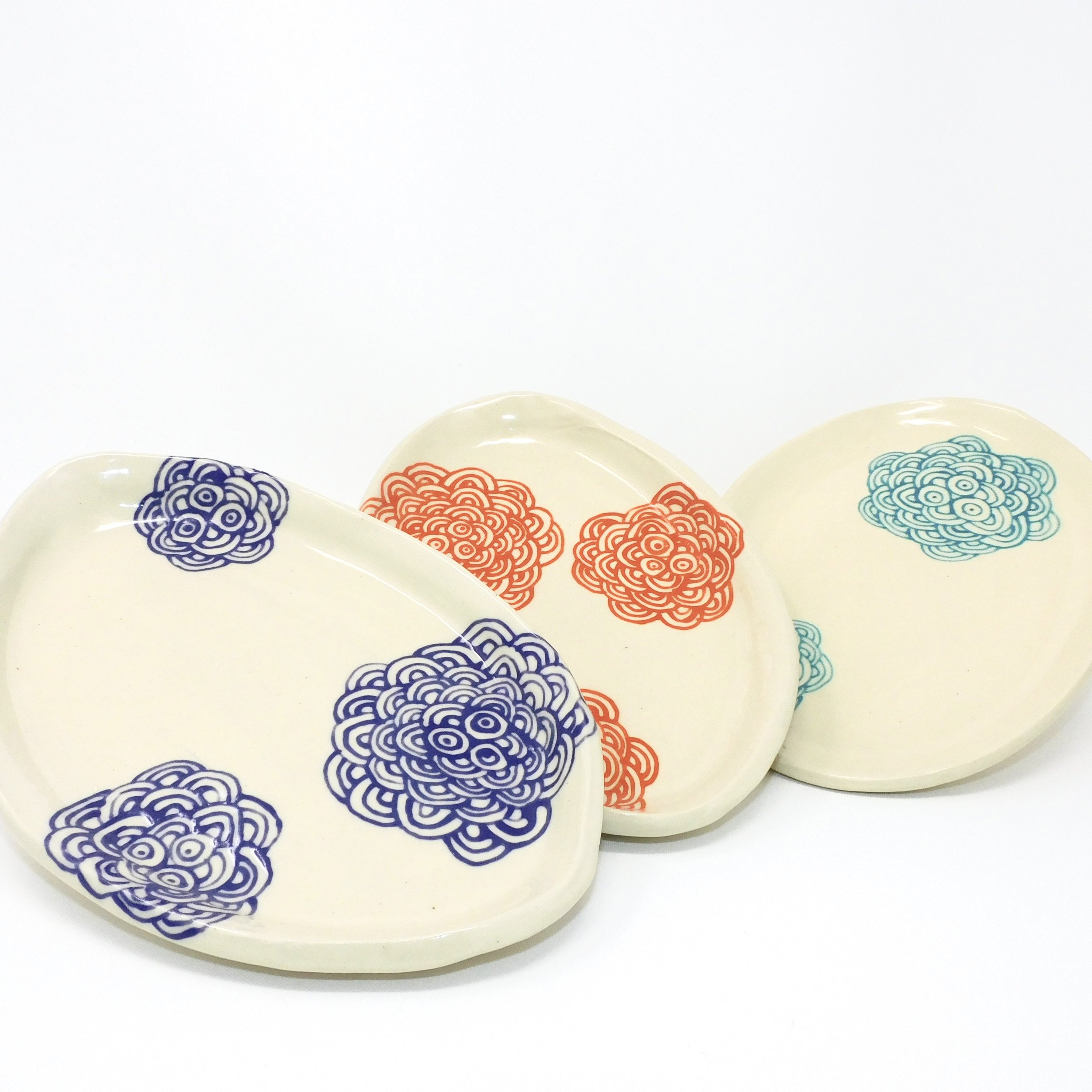 oval dishes purple orange teal.jpg