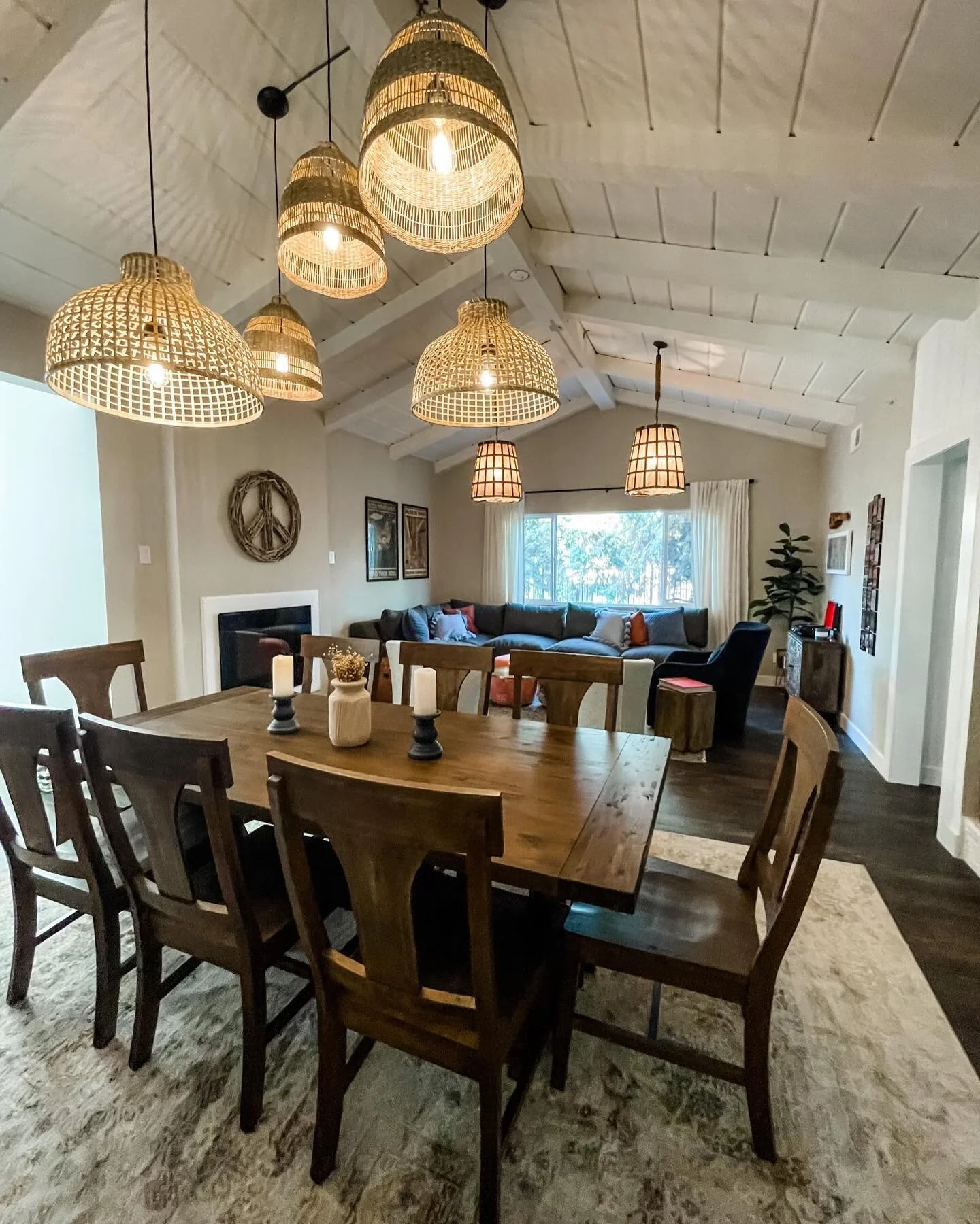 Swipe for the before ➡️ of this art and music room. 

Fun facts:

*️⃣ The 2 lights over the sectional were a great find by my client at a resale shop, and the 5 over the big table are an IKEA DIY I pulled off with the help of our electrician

*️⃣ The