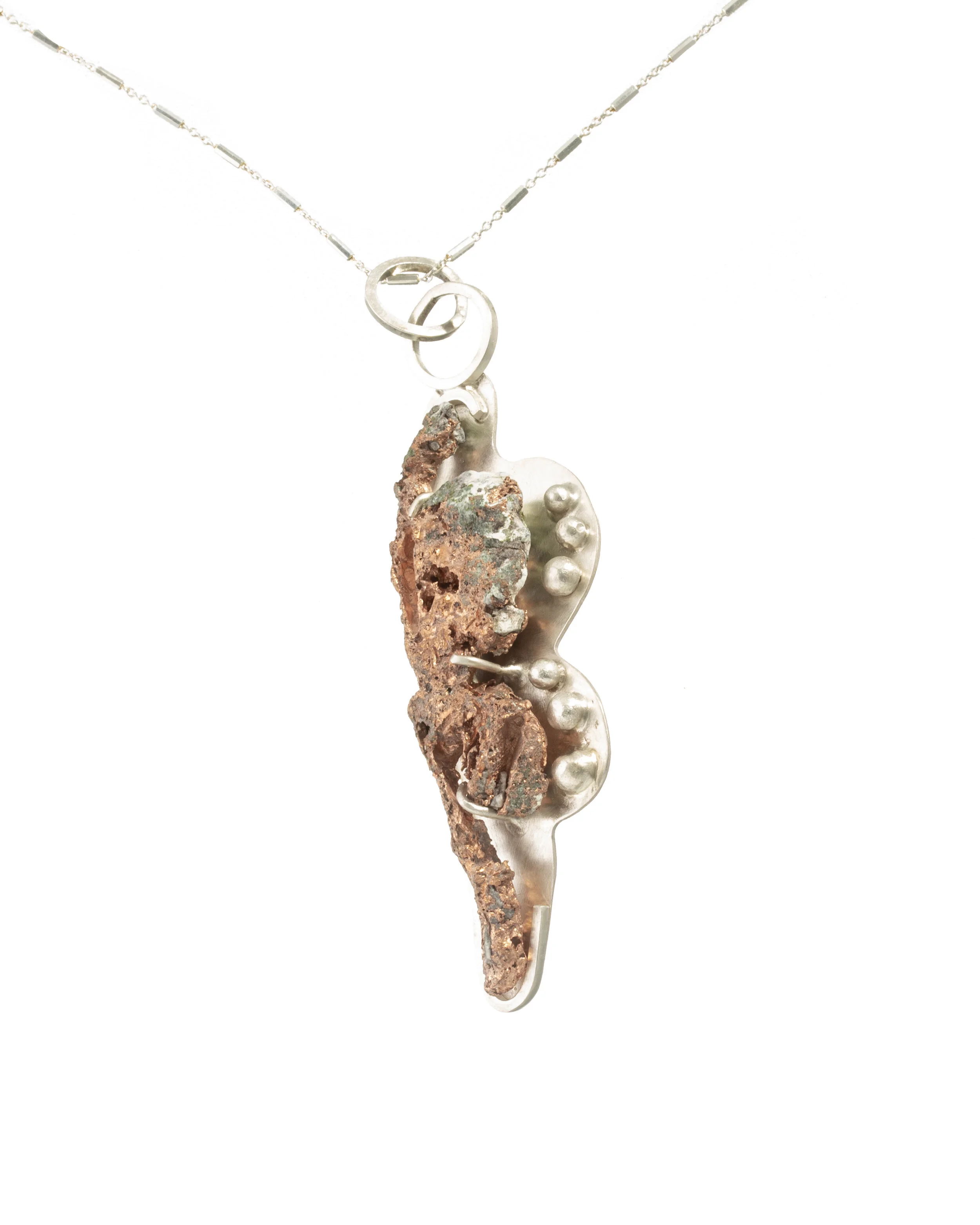 Unique copper ore in sterling silver inlay, with sterling silver chain.