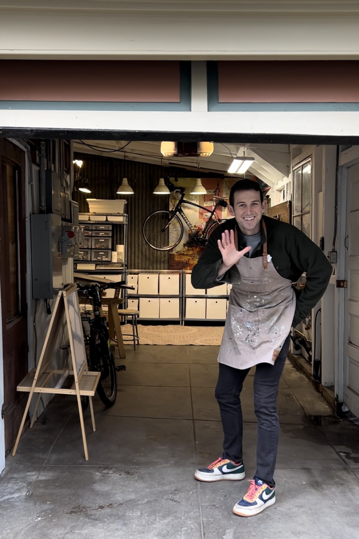 Joe Waving at Garage Door in Studio.jpg