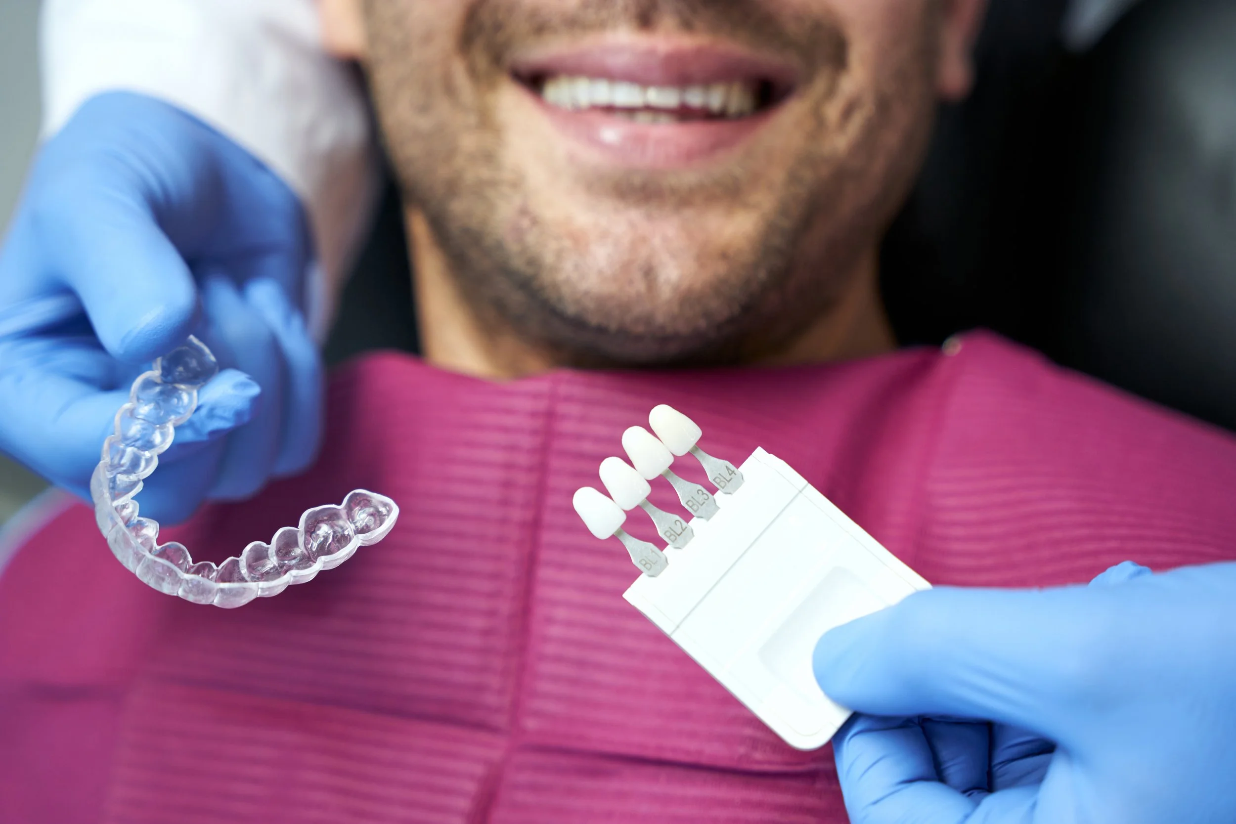 Boulder dental team with patient in treatment chair, providing professional clear aligner orthodontic care services.
