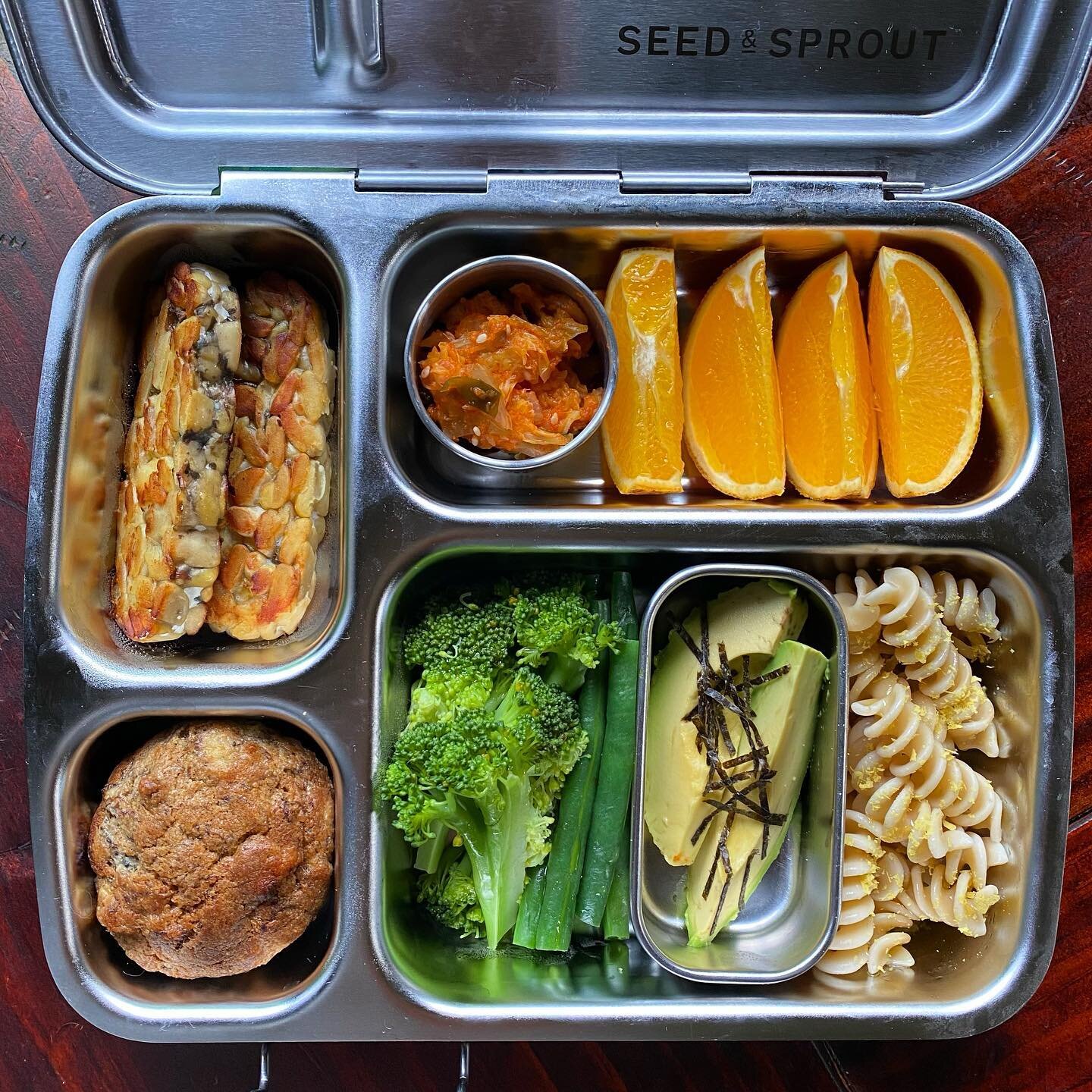 Finn&rsquo;s lunchbox for today 🍽

Fava bean tempeh
Steamed broccoli + green beans
Spelt spirals with olive oil 
Avocado + toasted nori
Kimchi
Orange 
Wholemeal banana cinnamon muffin