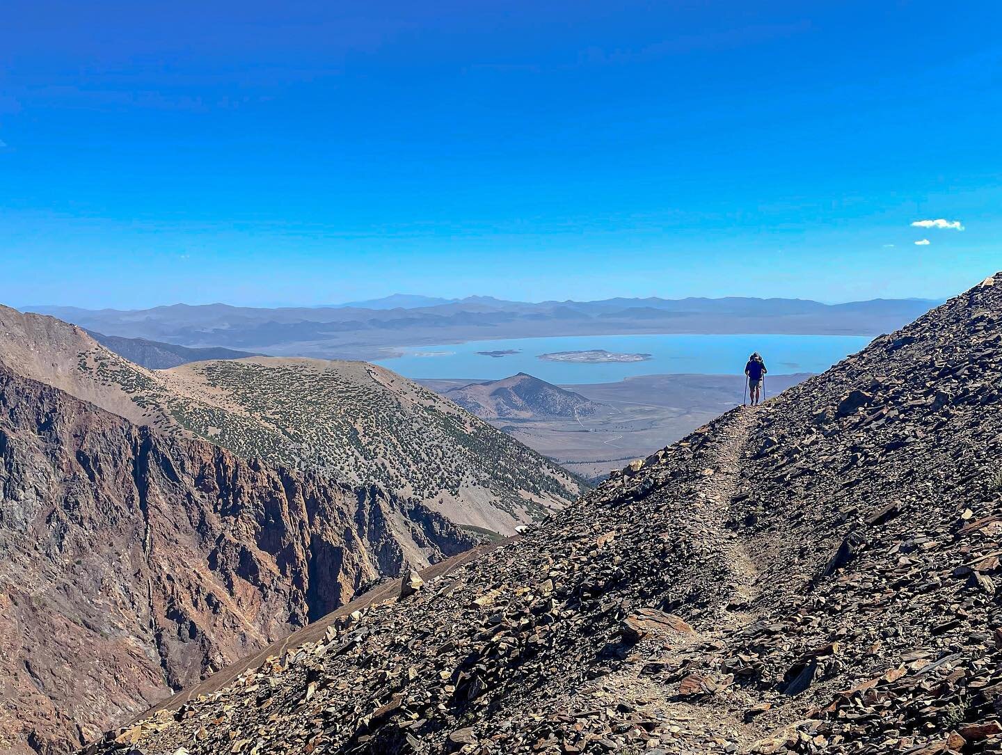 Day 2. Climbing over Koip Peak Pass up some steep, exposed switchbacks into the valley over, holding Alger Lakes. Quick summit in between to the top of Parker Pass at 12,861’. Incredible views from another world, with the colorful red and black