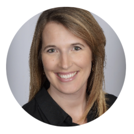 Headshot of a woman with shoulder-length light brown hair, smiling, wearing a black top, against a light gray background.