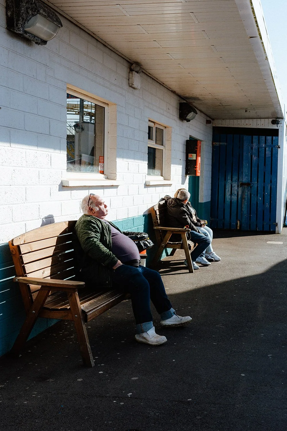 Photo of man soaking up the Portrush sunshine