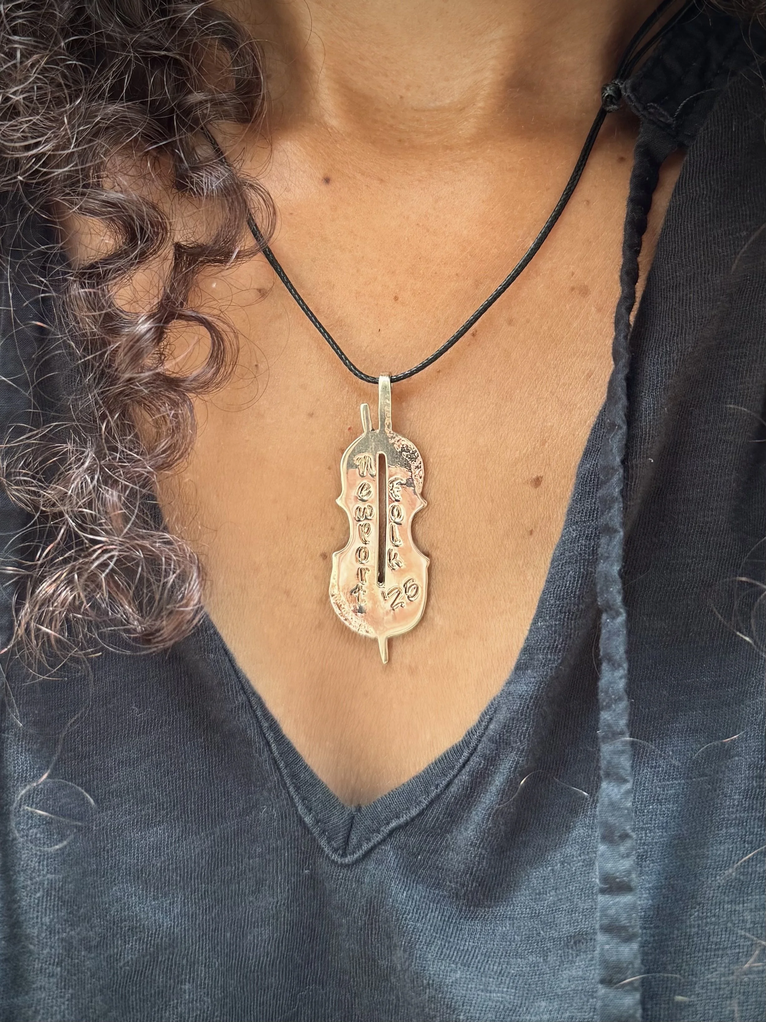 newport pendant 2025 on neck.jpg