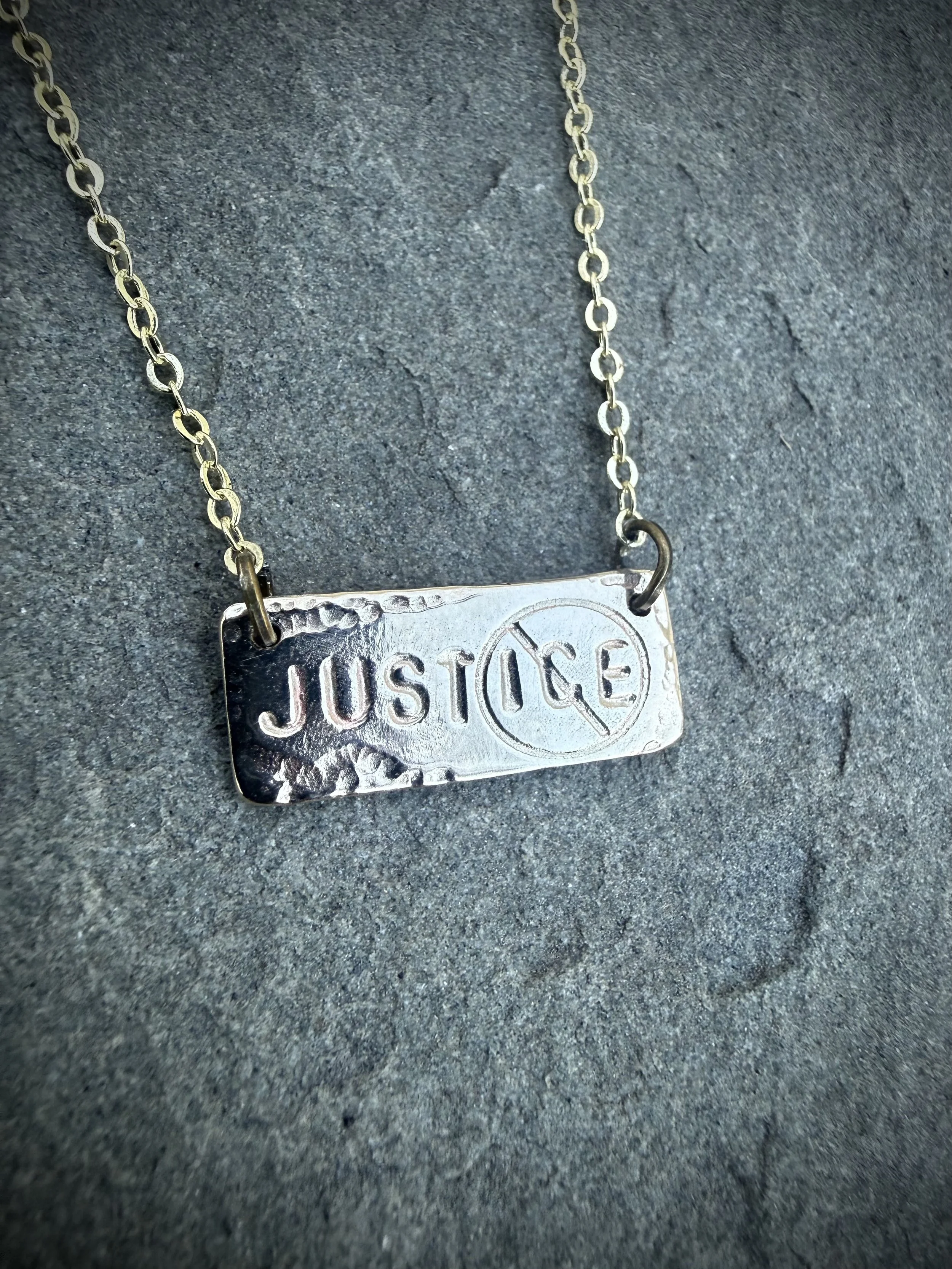 Justice necklace brass.jpg